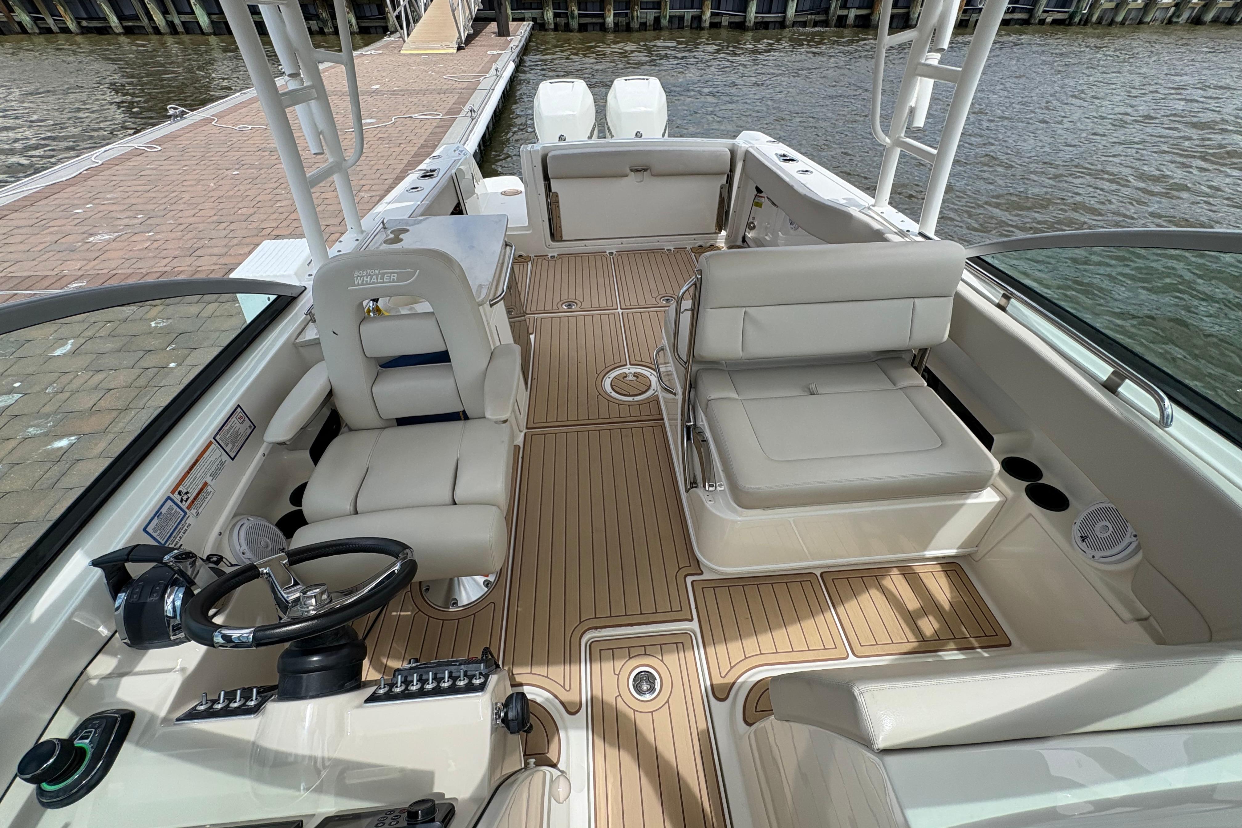 2017 Boston Whaler 270 Vantage boat interior with seating and steering wheel.