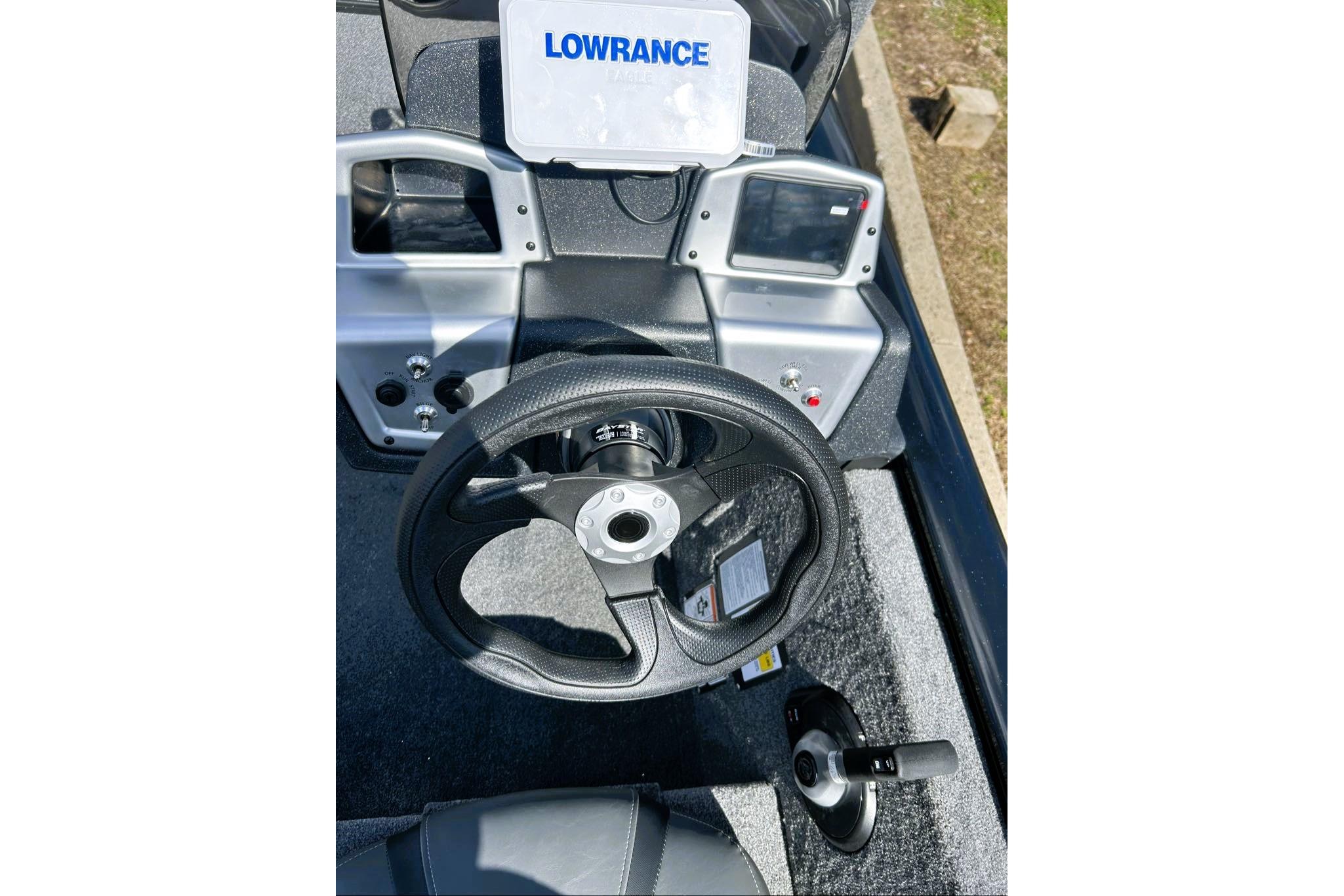 Steering console of 2026 Tracker Pro Team 195 boat with Lowrance electronics.
