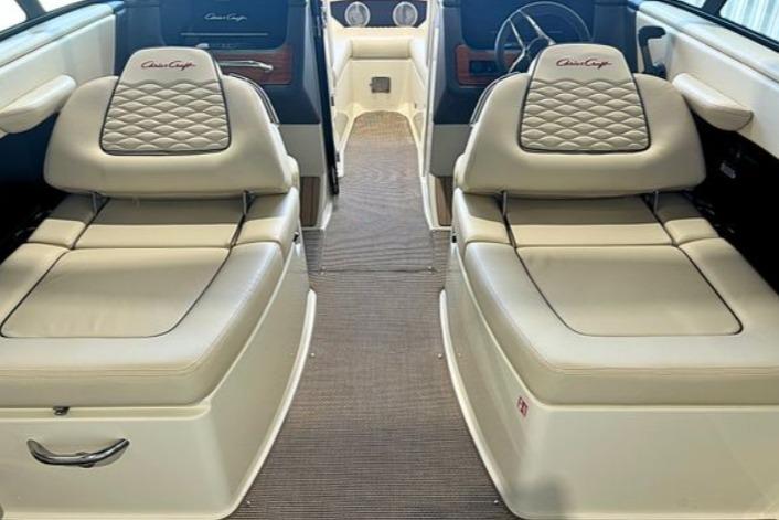2025 Chris-Craft Sportster 25 interior with luxurious seating and elegant design.