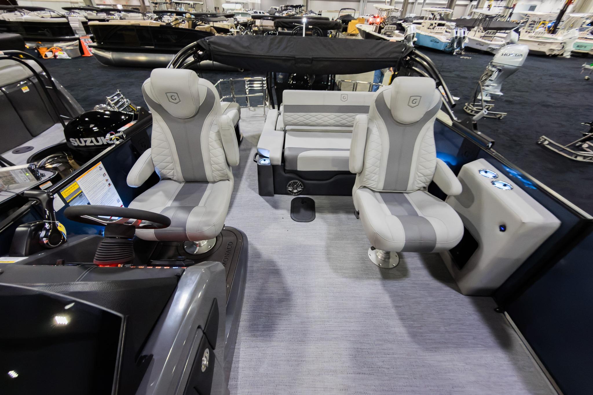 2026 Godfrey Monaco 235 boat interior with plush seating and modern design.