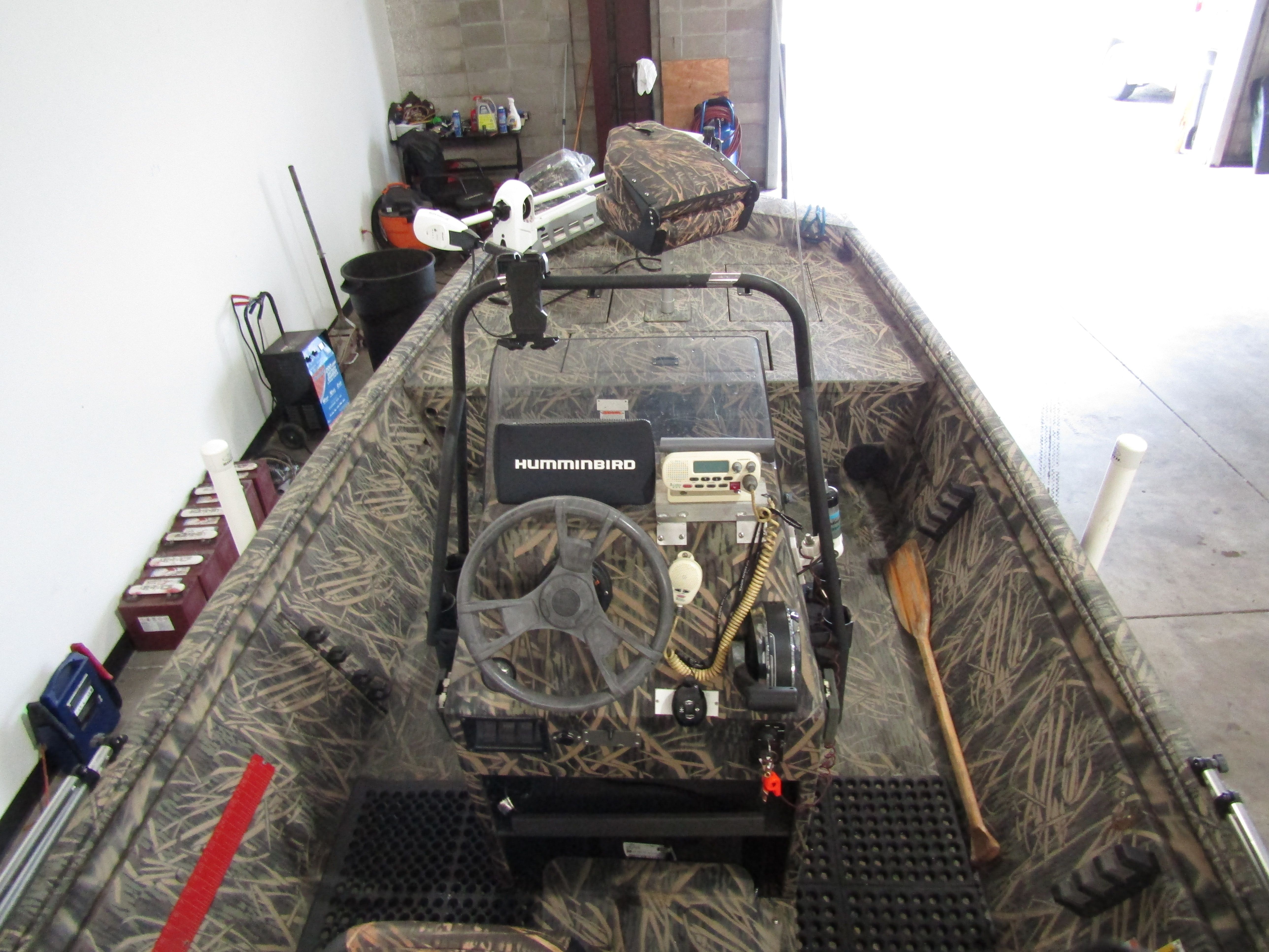 The image shows the cockpit of a 2016 Lowe 186 boat with a Humminbird fish finder.