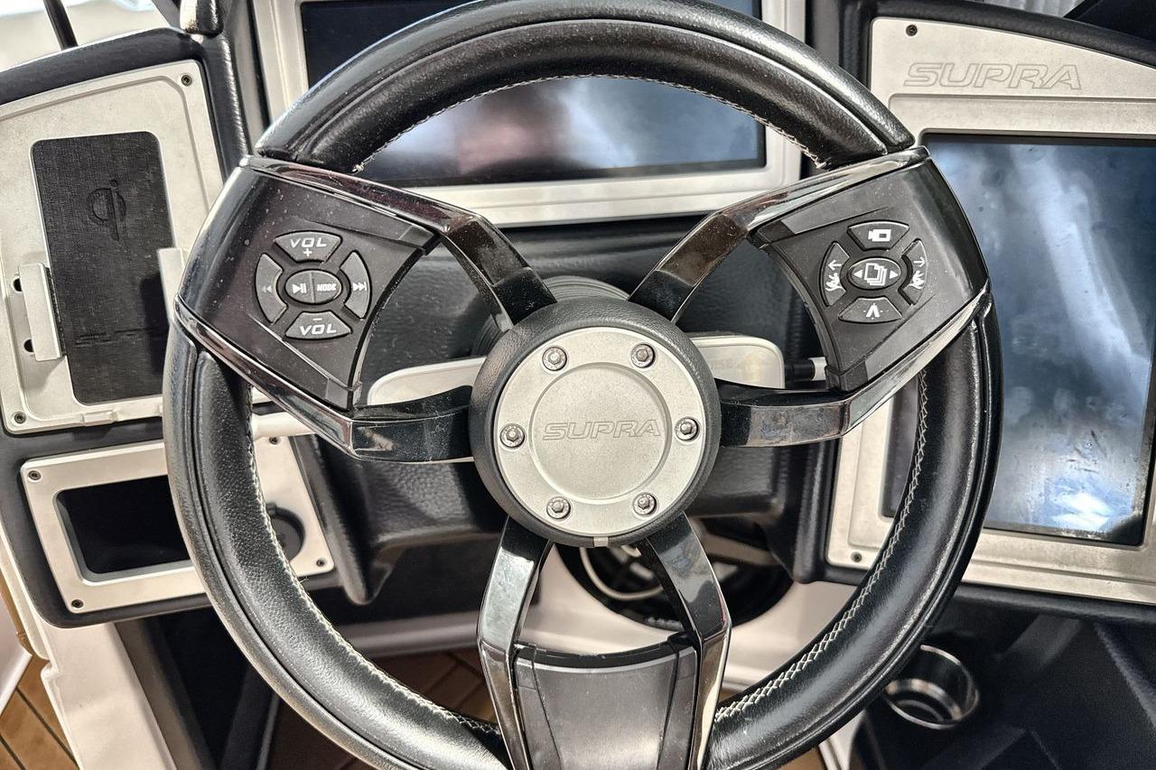 2020 Supra SE steering wheel with integrated controls and dashboard display.