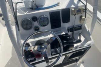 2016 Yamaha Boats 190 FSH Sport dashboard with steering wheel and controls.