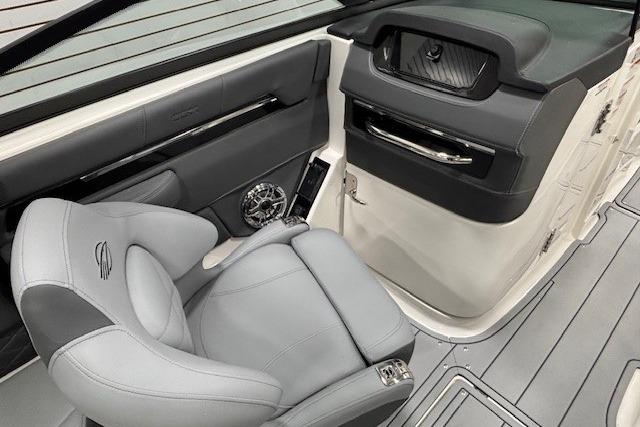 2026 Chaparral SSX 8 boat interior with sleek gray seating and modern dashboard design.