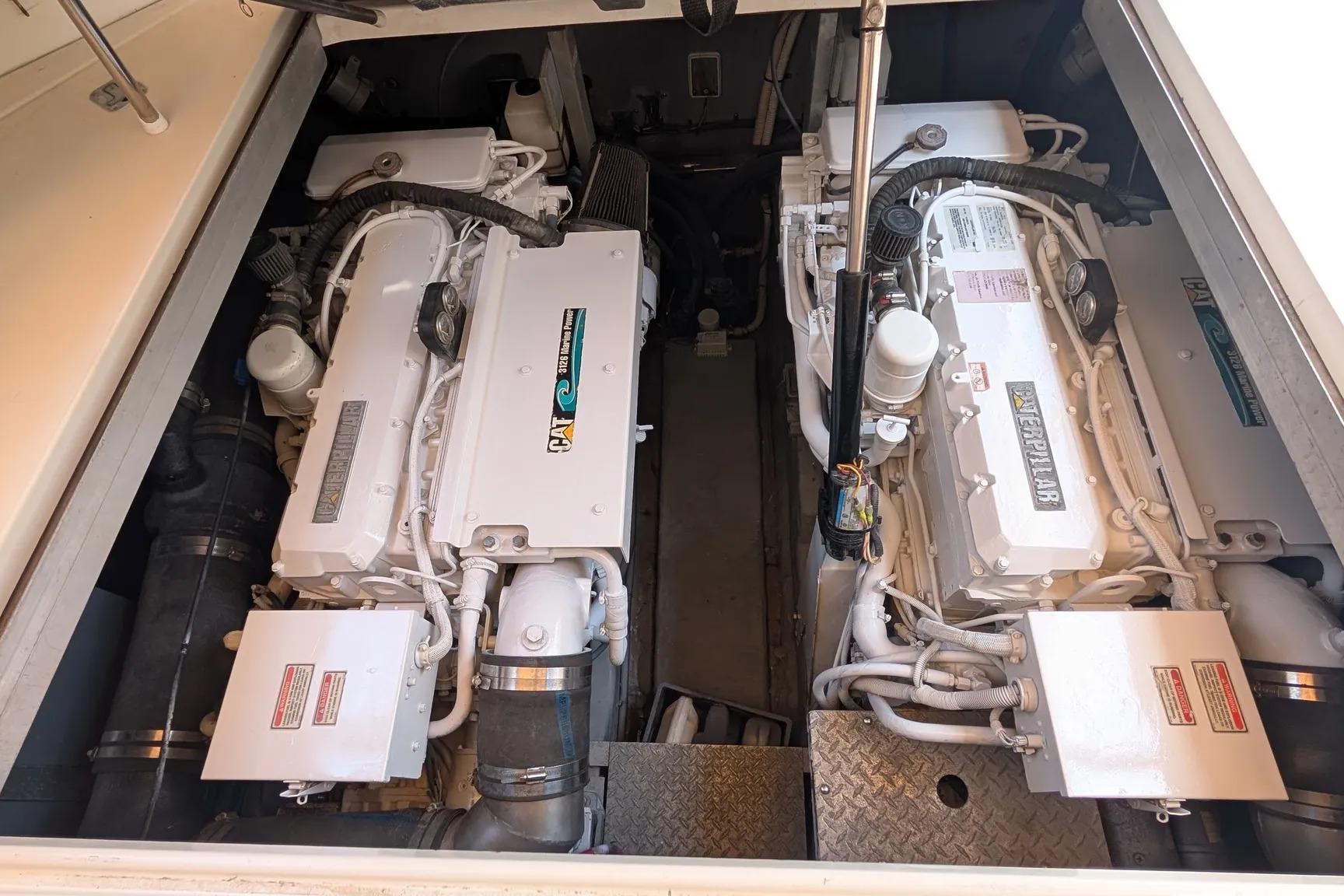 Engine compartment of a 2000 Sea Ray 380 Sundancer with twin Caterpillar engines.