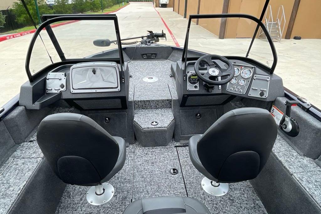 2026 Tracker Pro Guide V-175 Combo boat interior with dual seats and control panel.