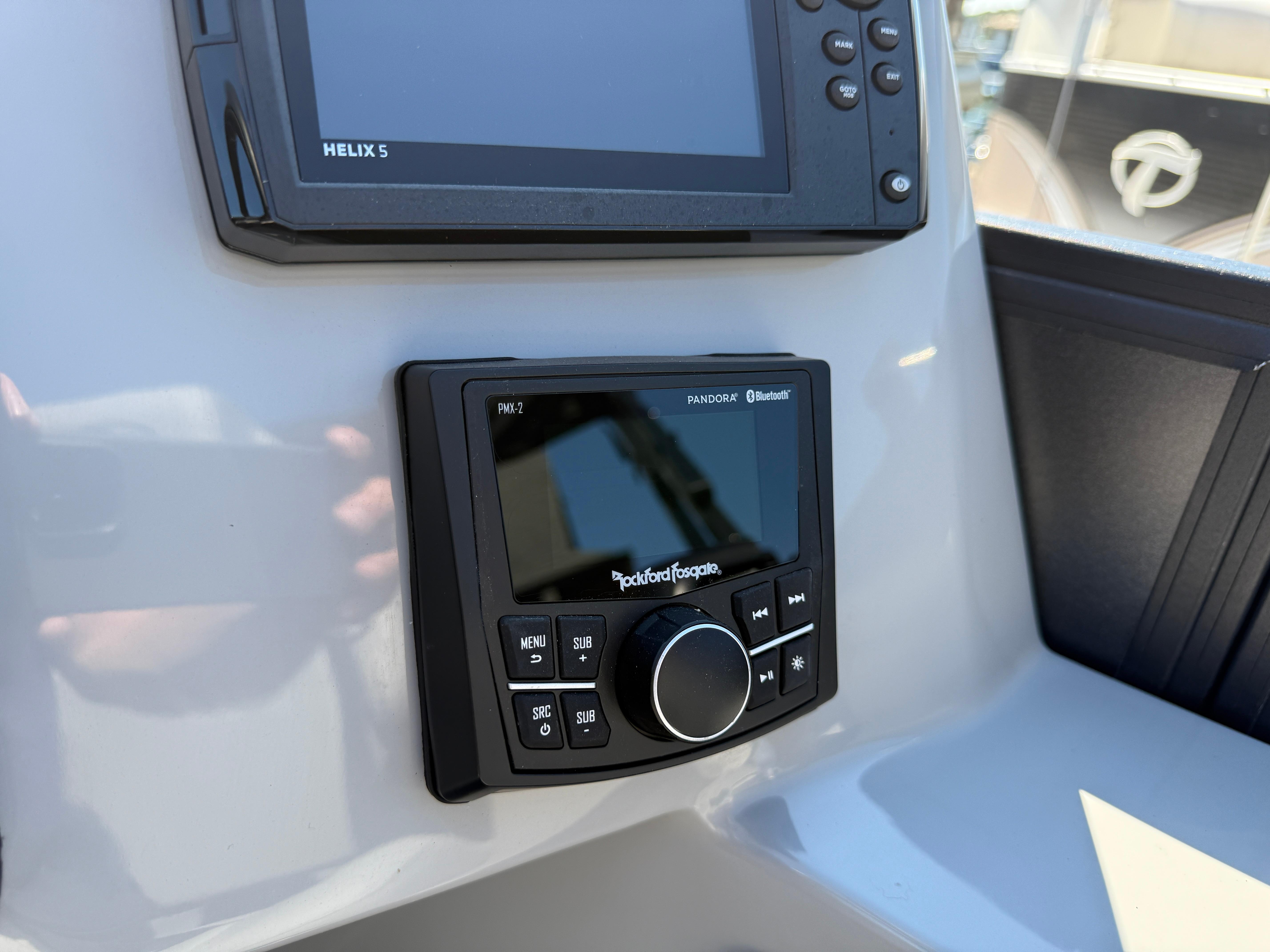 Control panel of 2026 Bentley Pontoons Legacy 223 Navigator with Rockford Fosgate audio system.