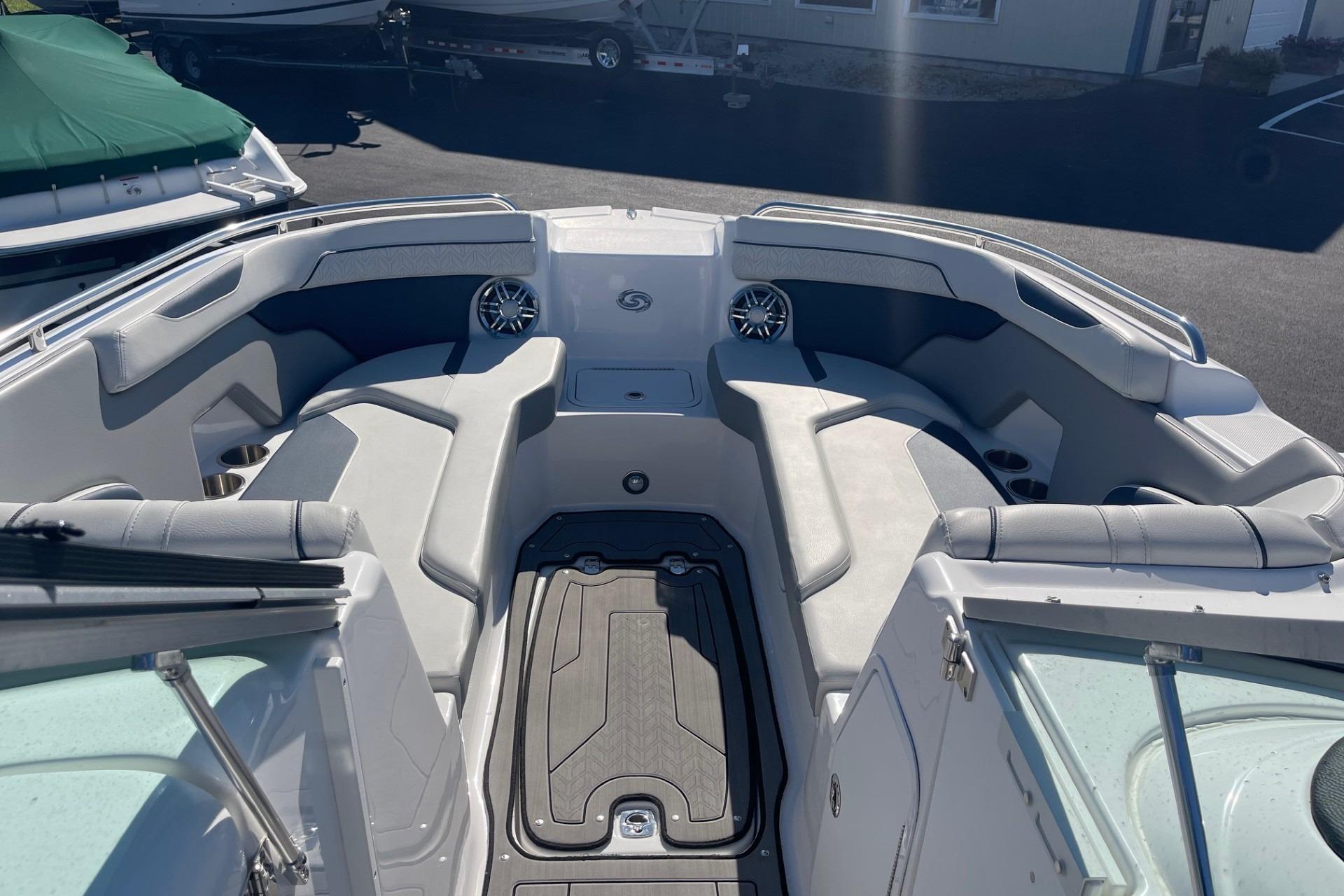 2023 Hurricane SunDeck 2400 OB boat interior with spacious seating and modern design.