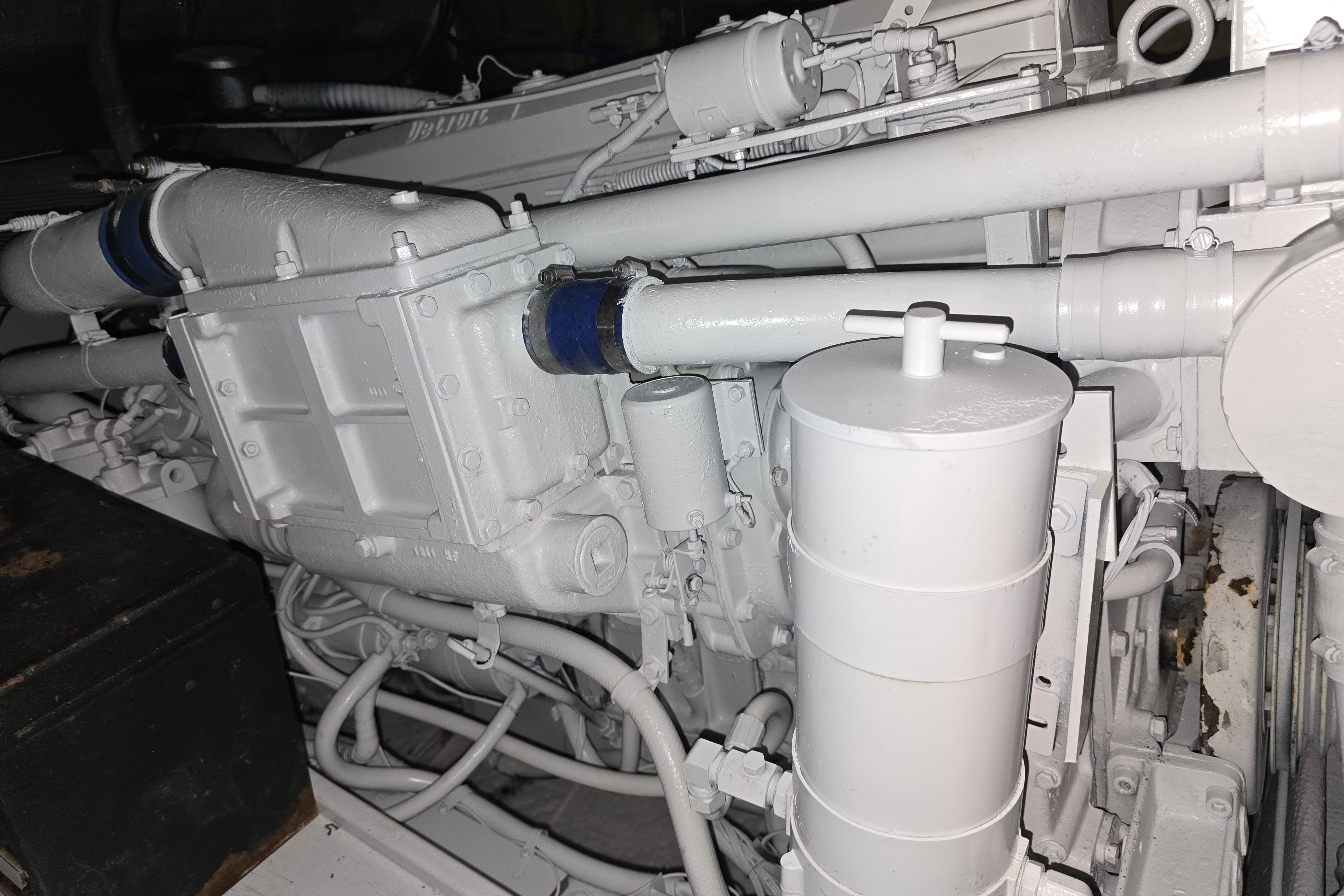 Engine compartment of a 1988 Post 46 Convertible boat, showcasing detailed mechanical components.