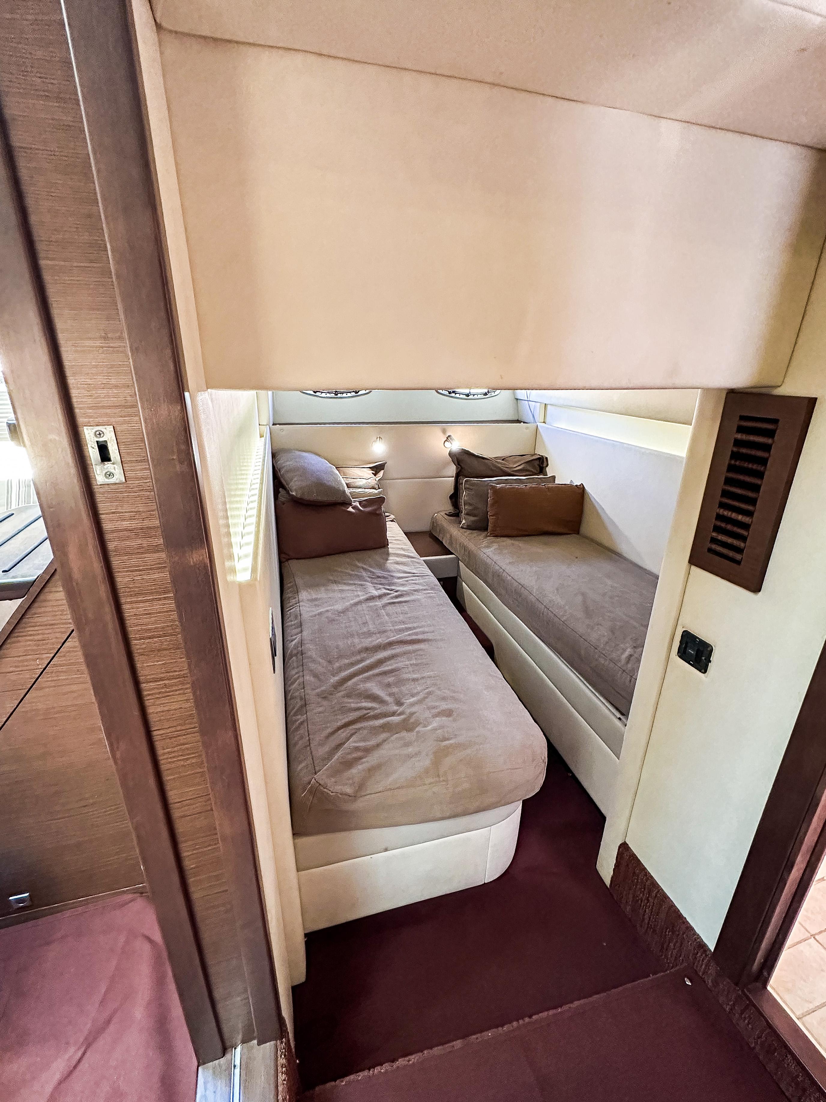 2013 Sea Ray 470 Sundancer cabin with twin beds and modern interior design.
