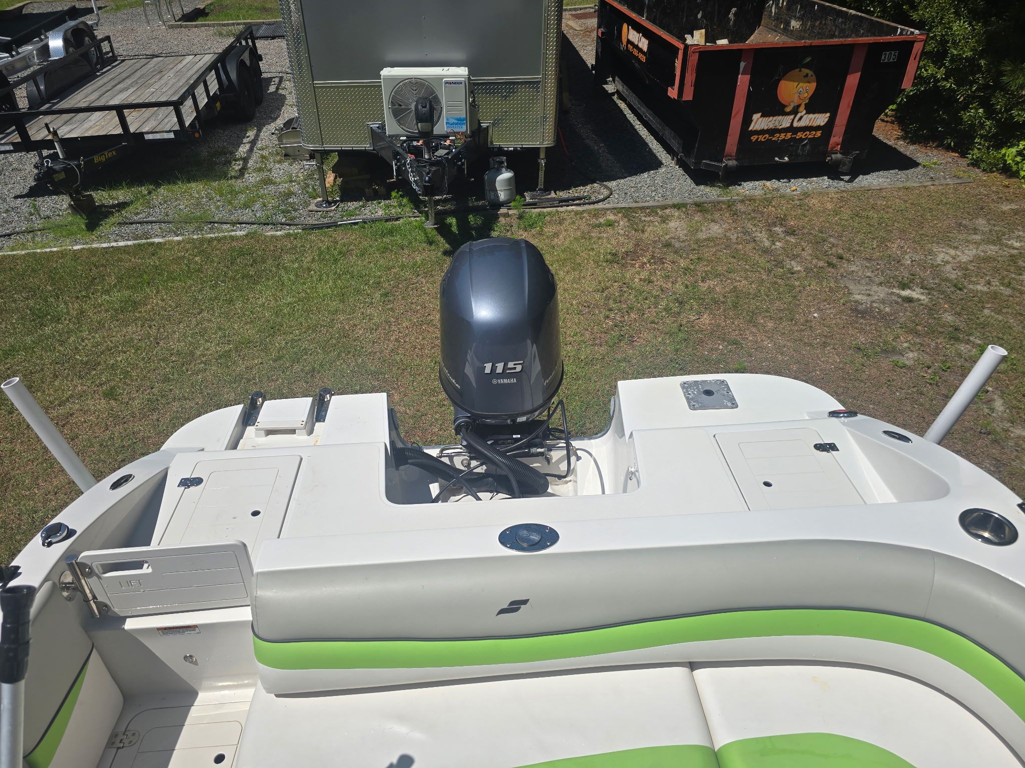 The image shows the stern of a 2017 Starcraft MDX 191 OB boat with an outboard motor.