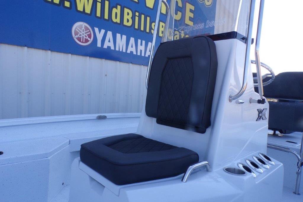 2026 Xpress H20B Bay boat seat with black cushion, near Yamaha sign.