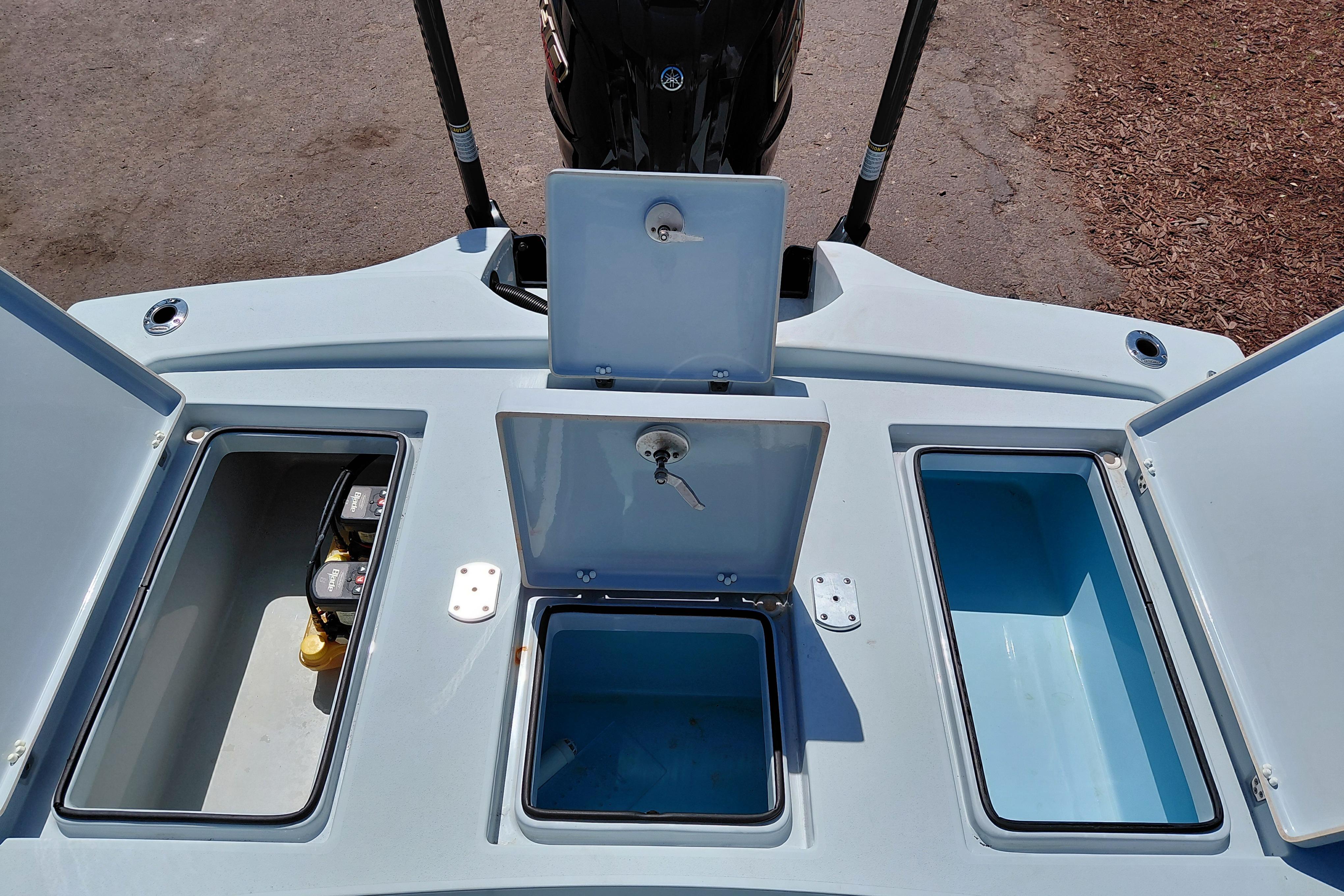 2022 Pathfinder 2300 HPS boat storage compartments and battery area, open view.
