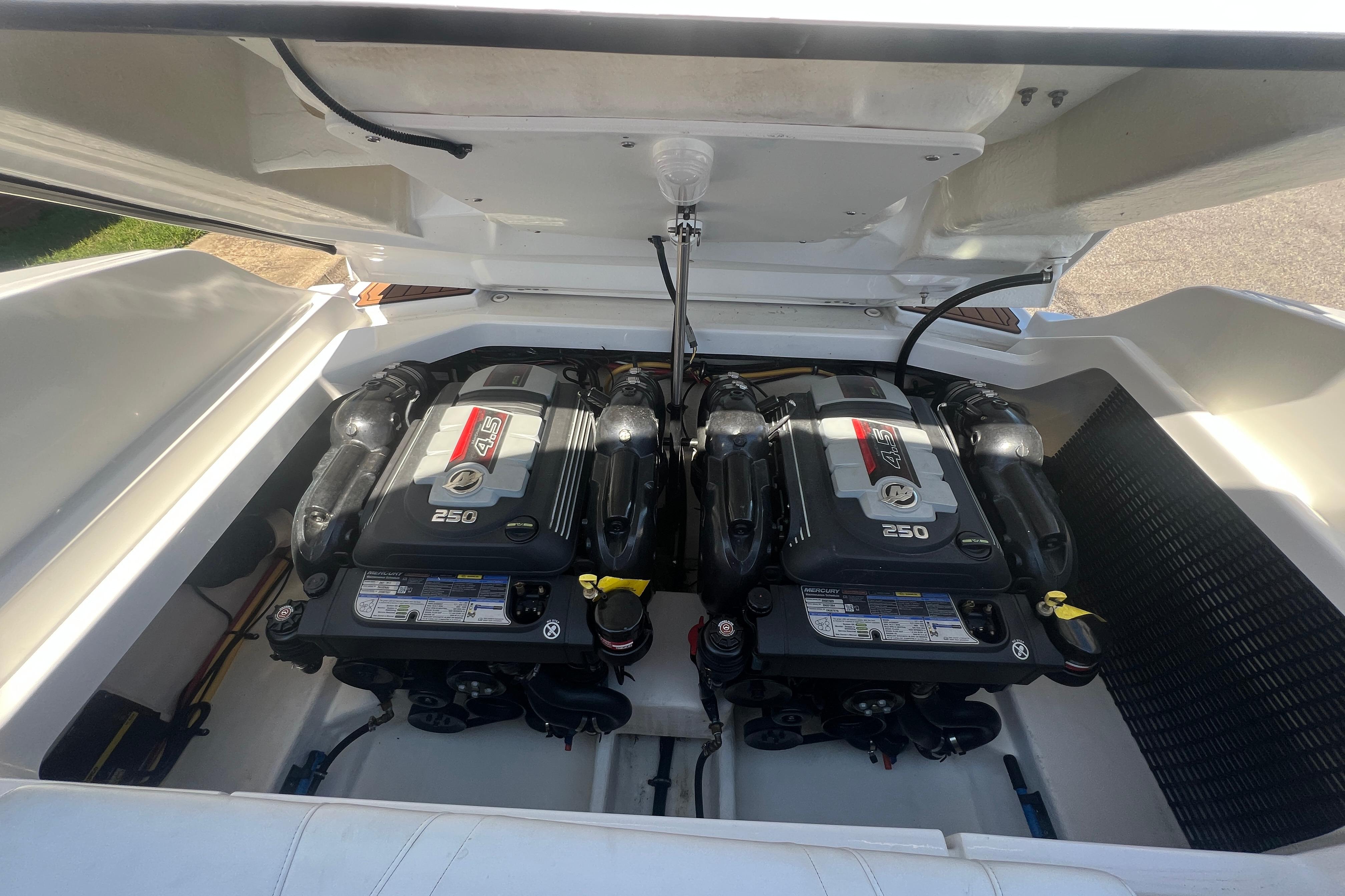 Engine compartment of a 2017 Monterey 298SS Super Sport boat, featuring dual 4.5L engines.