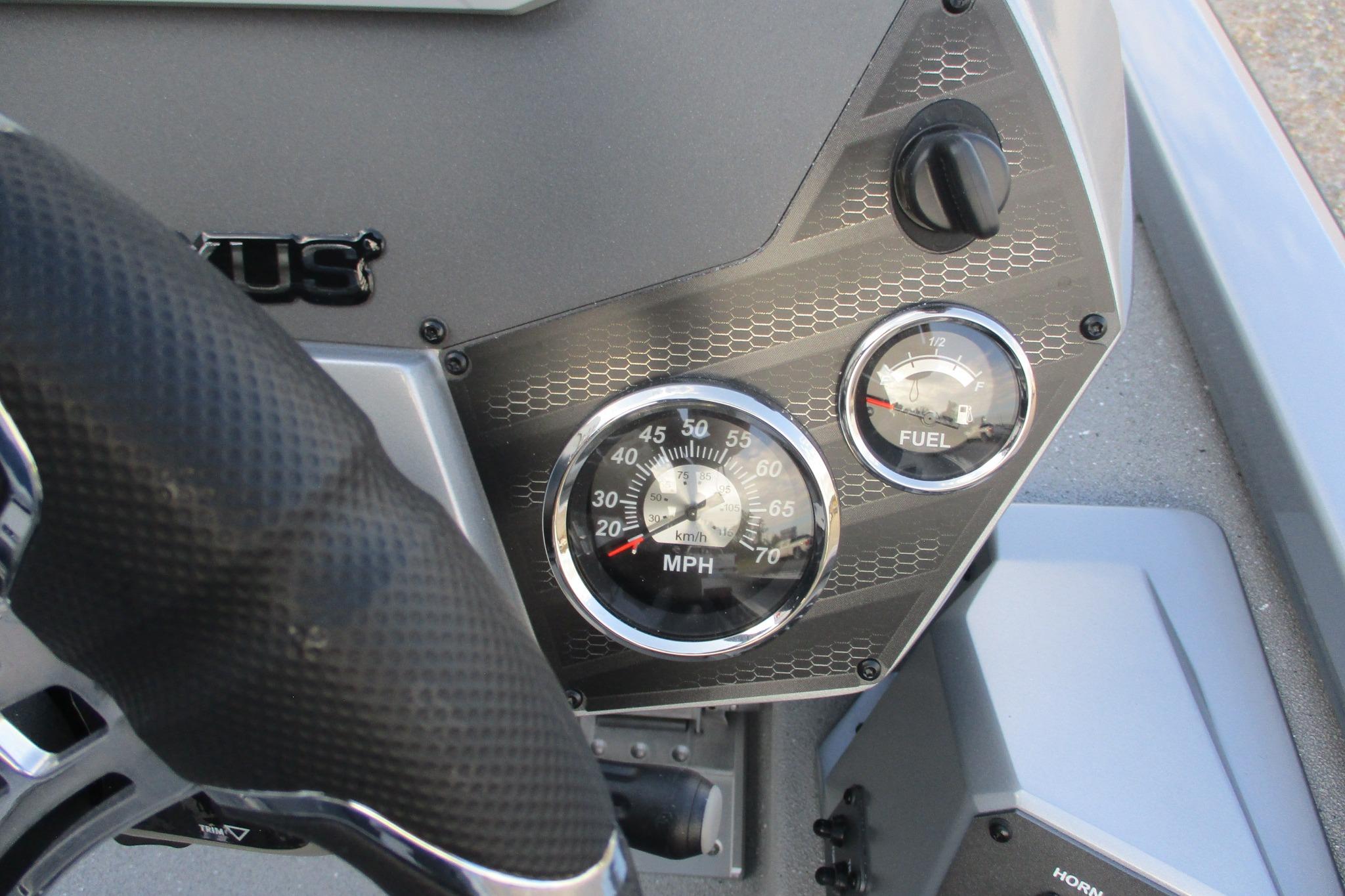Dashboard of 2026 Vexus AVX2080 boat with speedometer and fuel gauge.