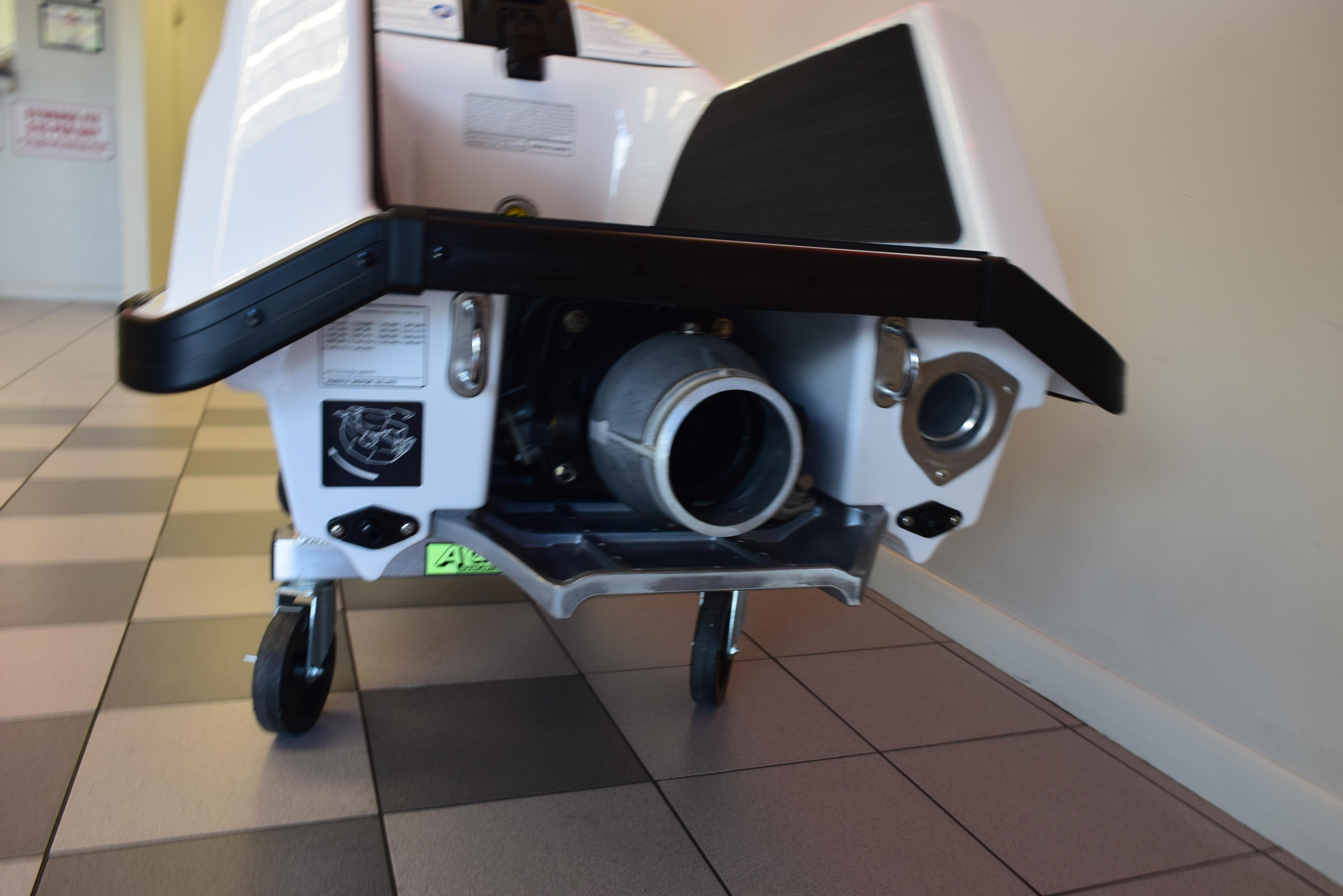 2025 Yamaha WaveRunner SuperJet rear view on display indoors.