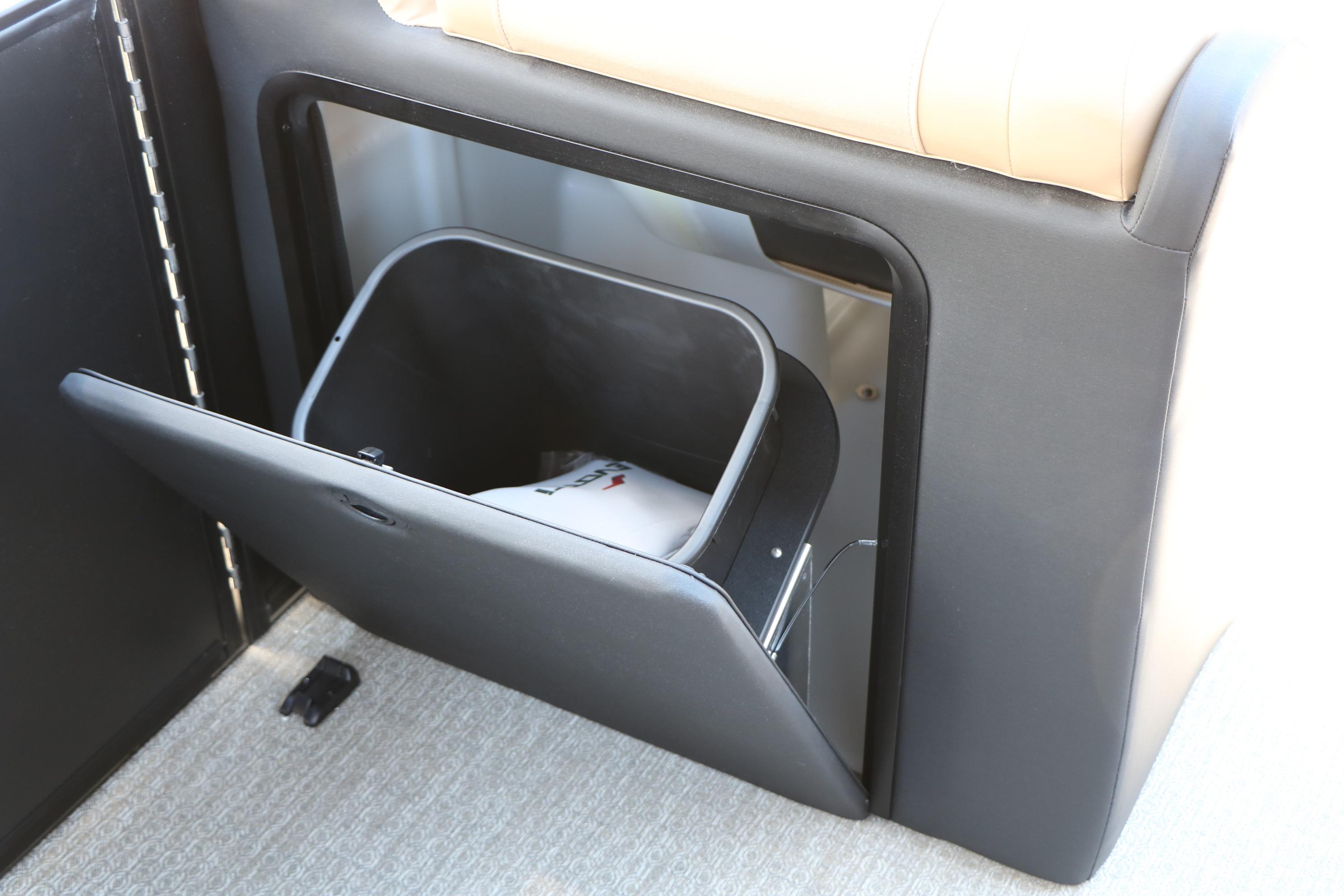 Built-in storage compartment in 2026 Evotti 521CS vehicle interior.