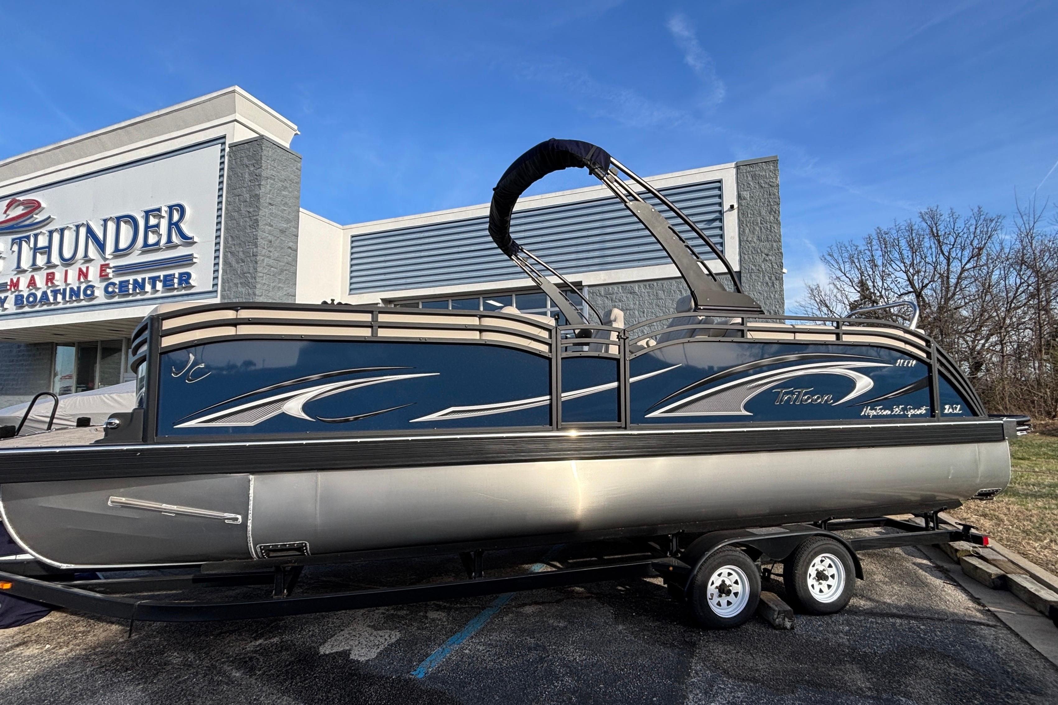 2026 JC Neptoon 25TT Sport pontoon boat on trailer at Thunder Marine Boating Center.