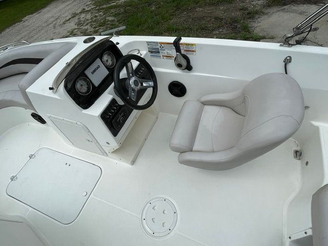 The image shows the cockpit of a 2018 Hurricane SS188 boat with a helm and seat.