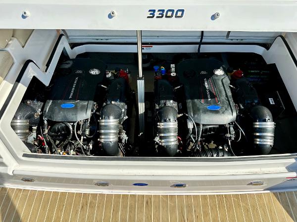 The engine compartment of a 2018 Regal 3300 boat with two powerful engines.