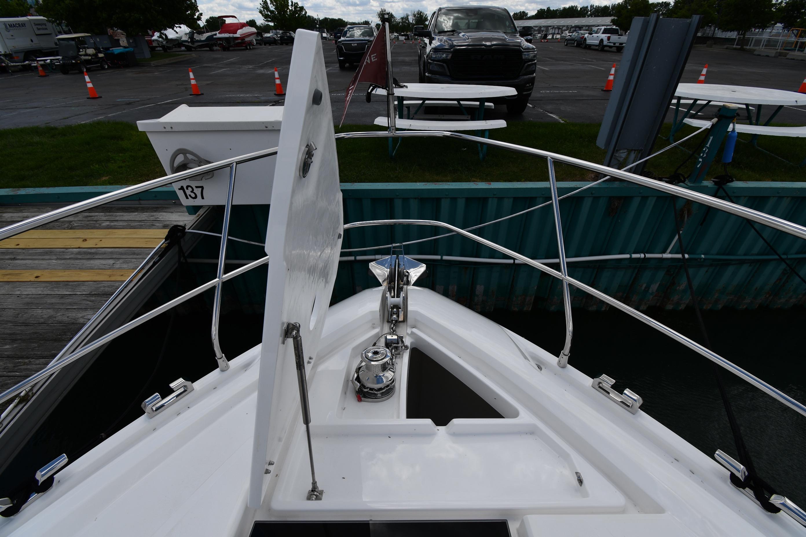 2024 Fairline G50 Targa yacht bow with anchor and railing at dock.