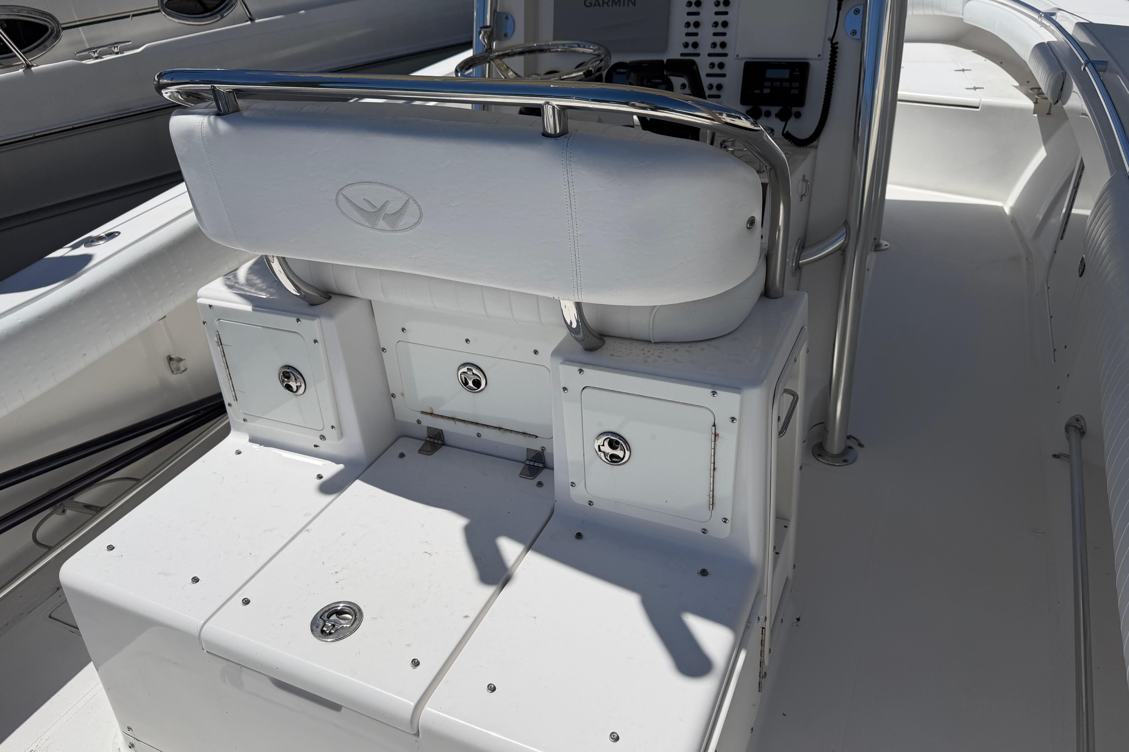 2006 Southport 26 Center Console boat interior with seating and storage compartments.