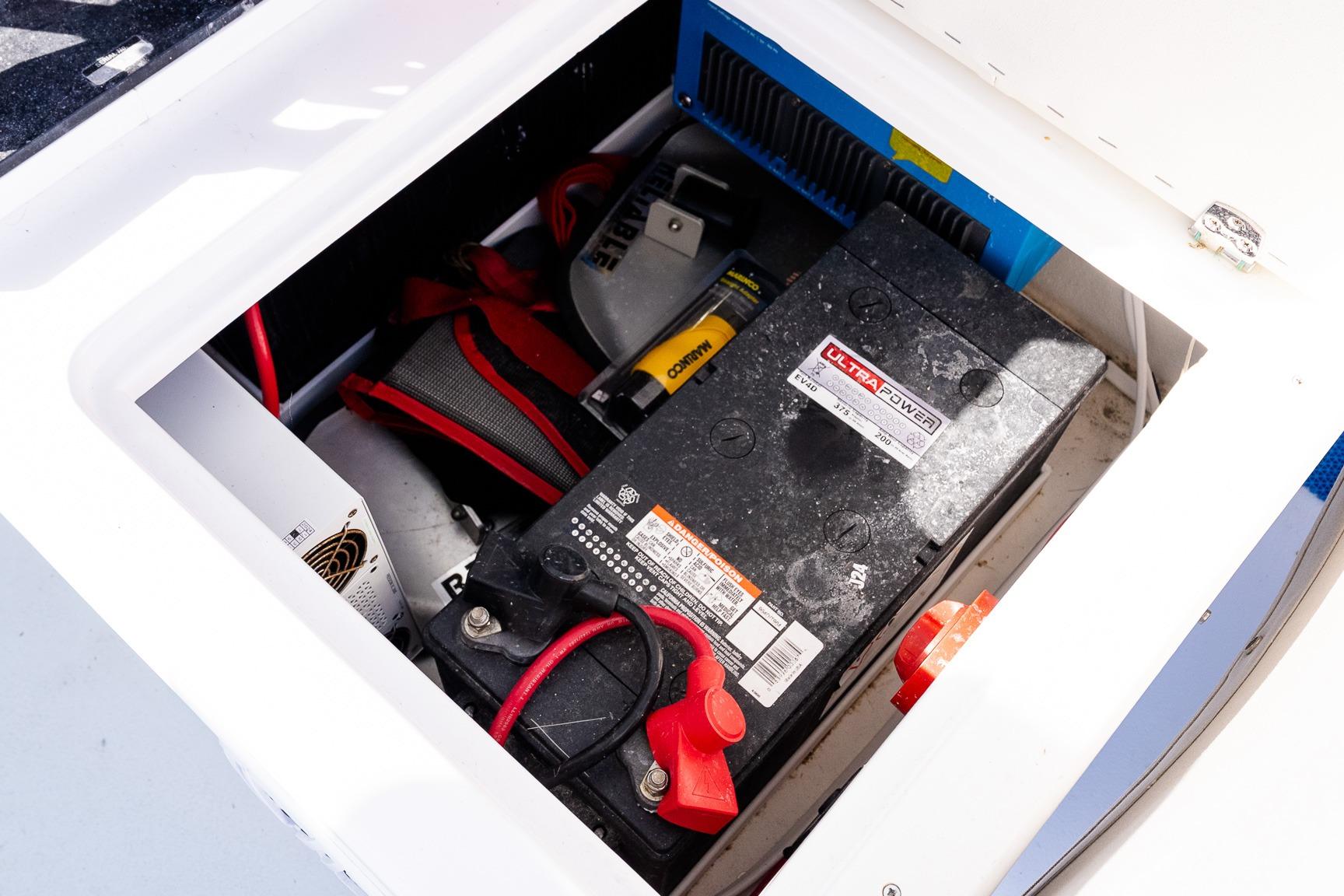 Battery compartment of 2024 Steiger Craft 31 Fisherman boat, featuring Ultra Power battery.