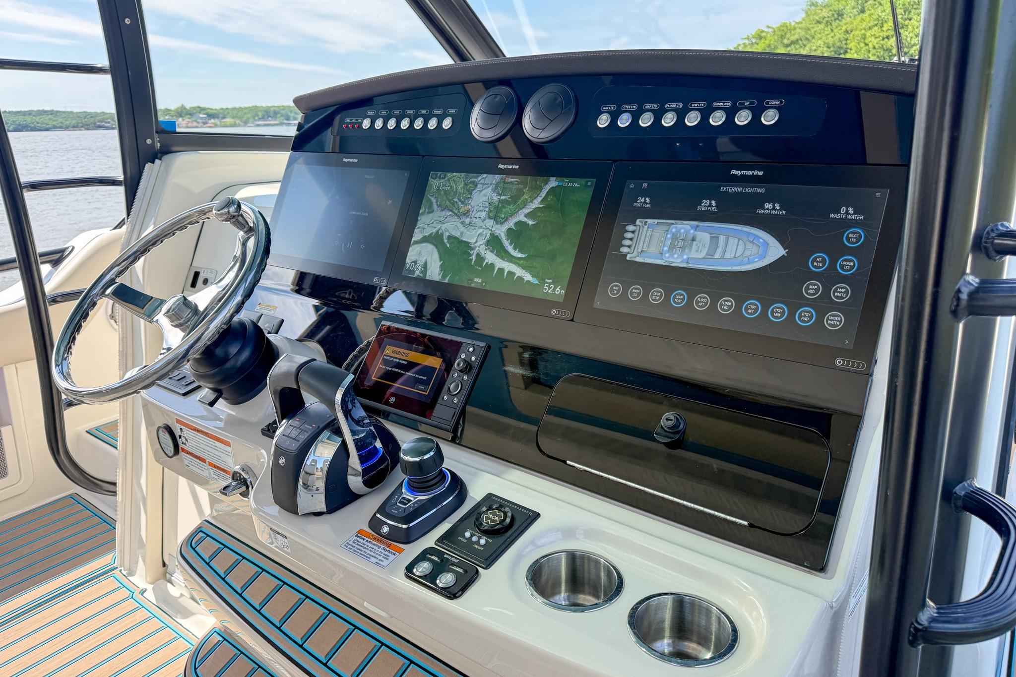 Control panel of 2021 Boston Whaler 420 Outrage with advanced navigation displays.