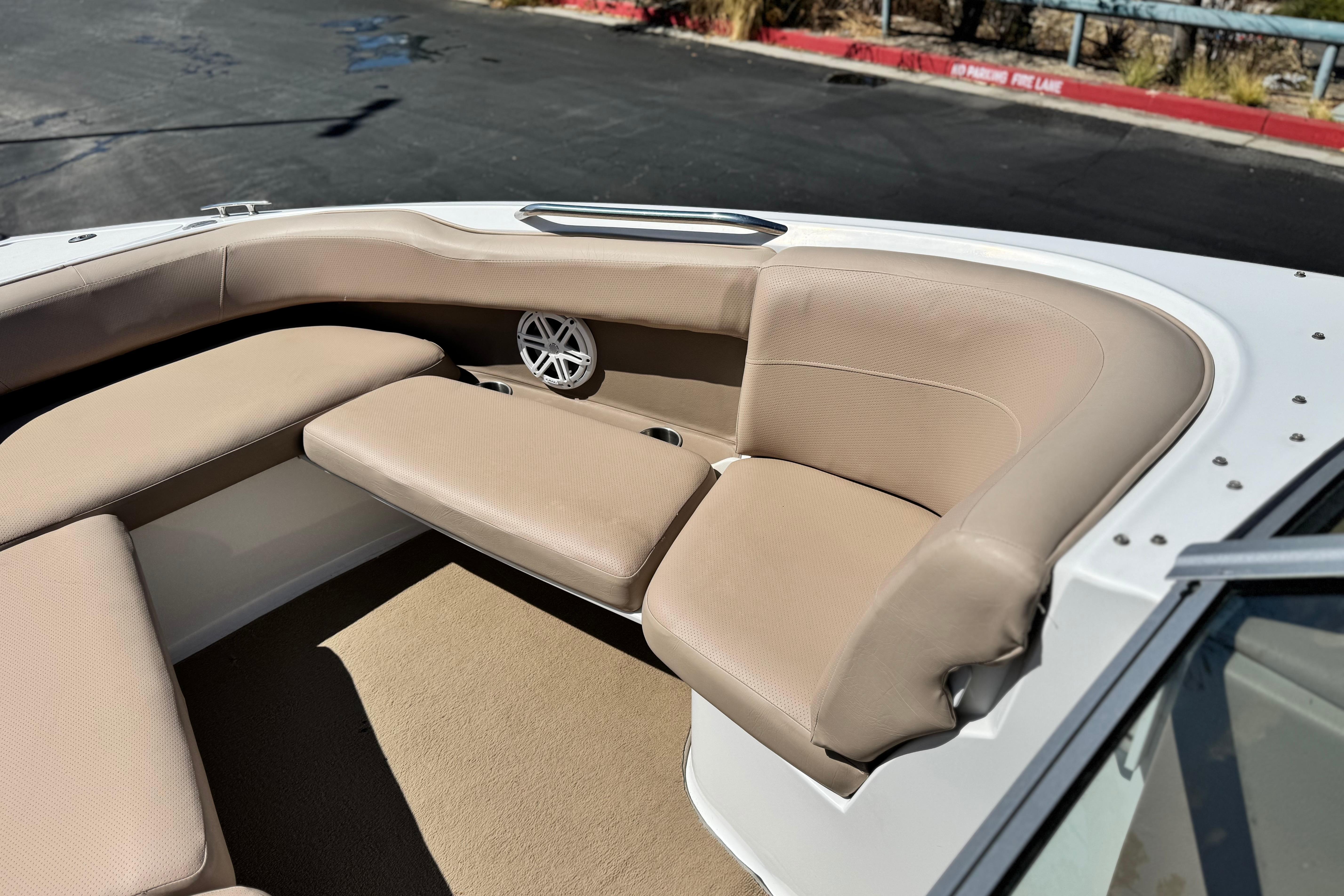 2008 Cobalt 262 boat interior with beige seating and speaker detail.
