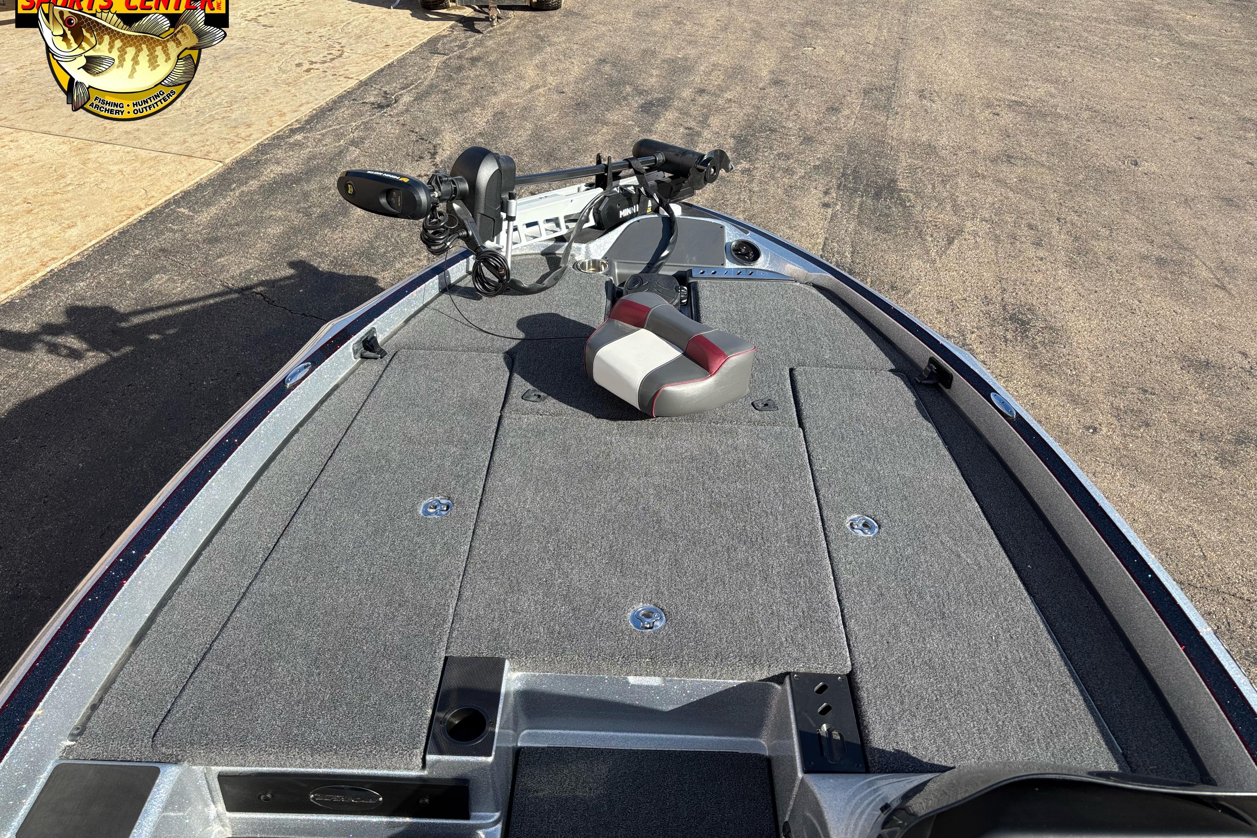 2025 Triton 18 TrX fishing boat deck with trolling motor and seating.