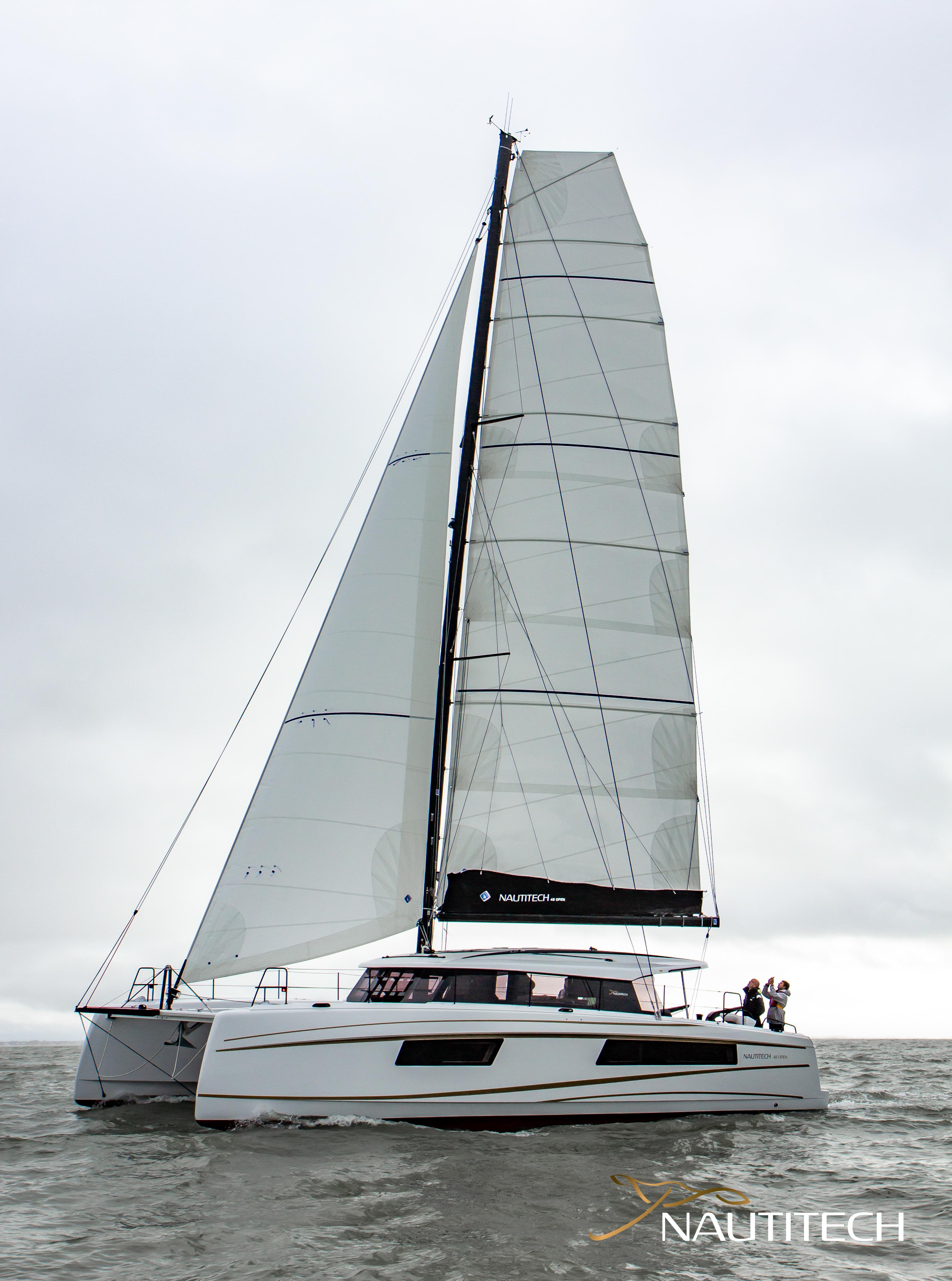 Sailing catamaran Nautitech 48 Open 2026 on water, showcasing sleek design and modern sails.