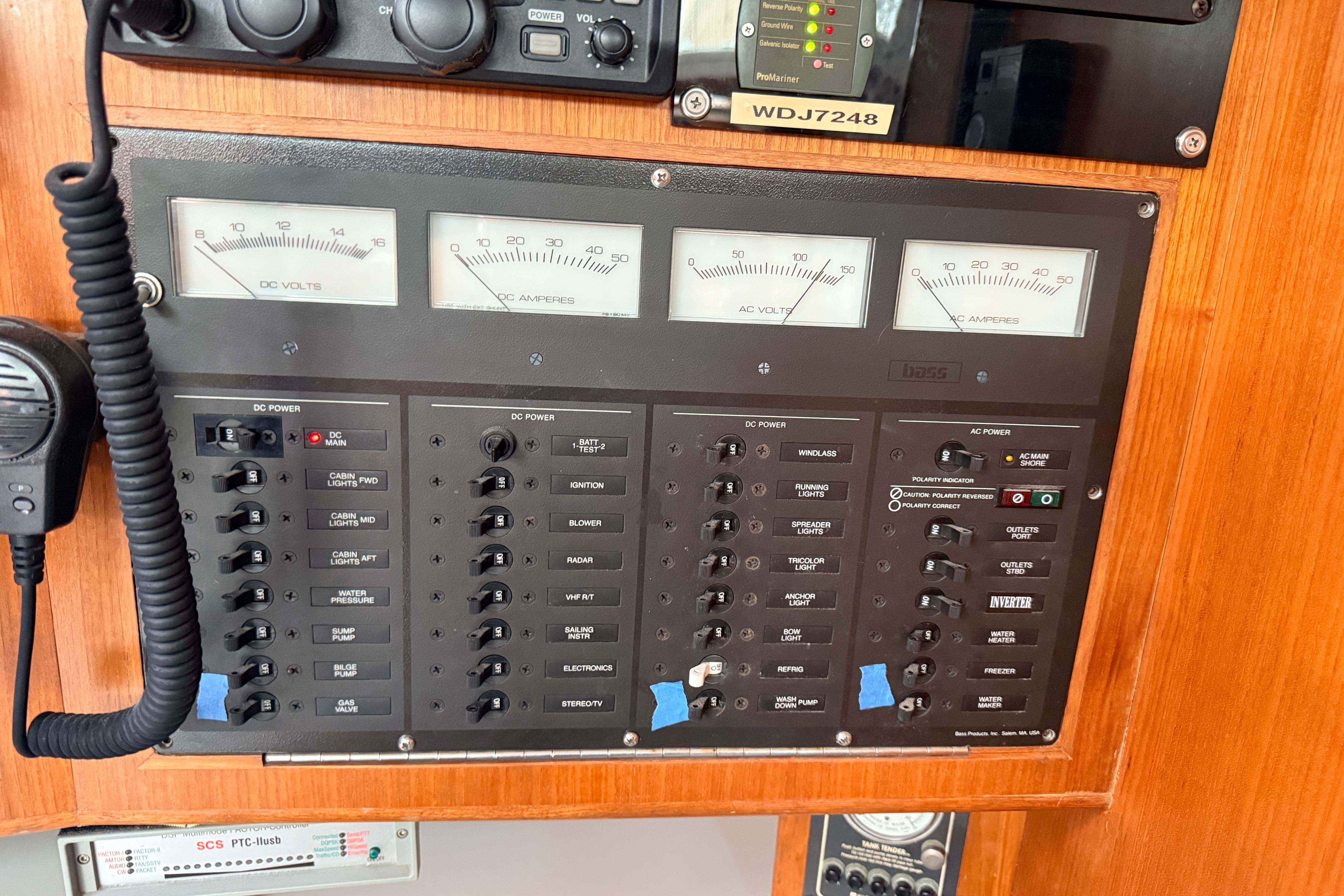 Electrical control panel on a 1987 Norseman 400 boat, featuring gauges and switches.