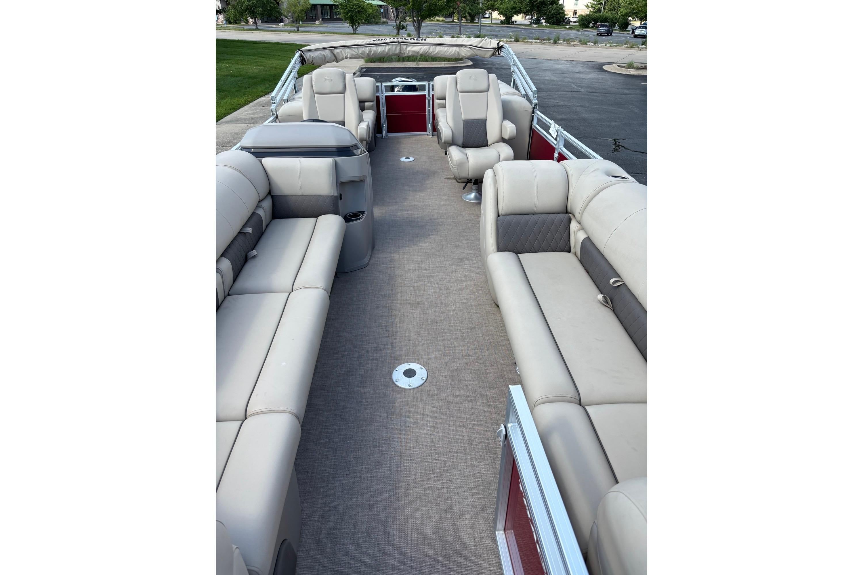 2024 Sun Tracker Party Barge 24 DLX interior with spacious seating and modern design.