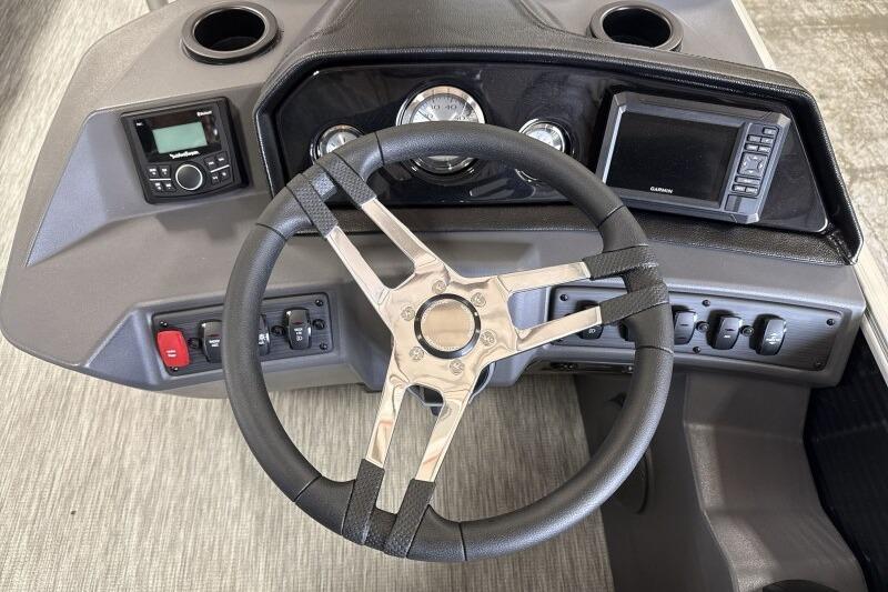 Steering console of 2026 Bennington 22 SSRSF boat with modern controls and gauges.