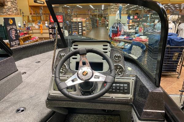 2025 Ranger VS1682SC Angler boat dashboard in a showroom setting.