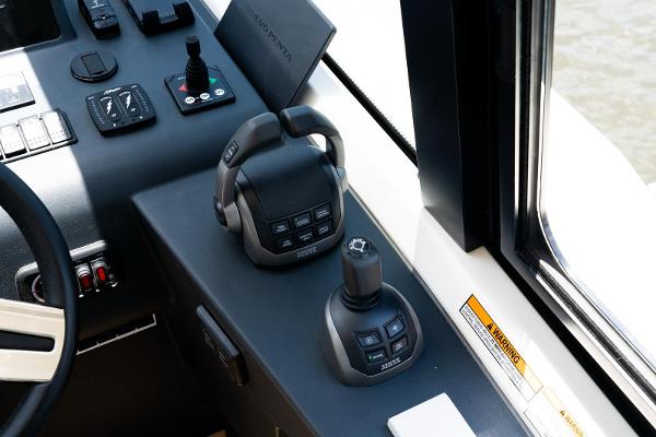 Control panel of 2022 Bavaria SR41 boat with joystick and throttle controls.