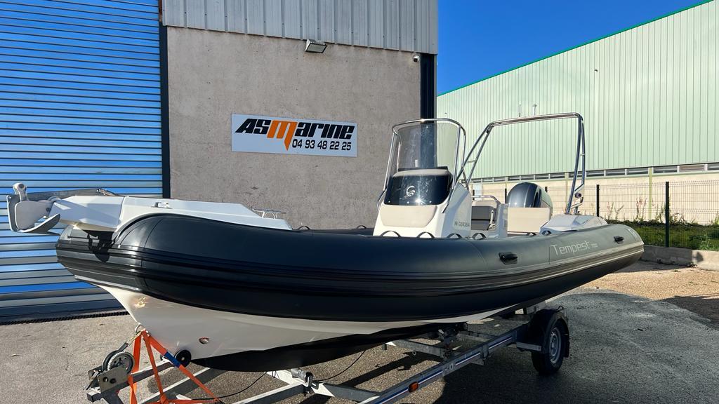 2023 Capelli Tempest 700 boat on trailer outside AS Marine building.