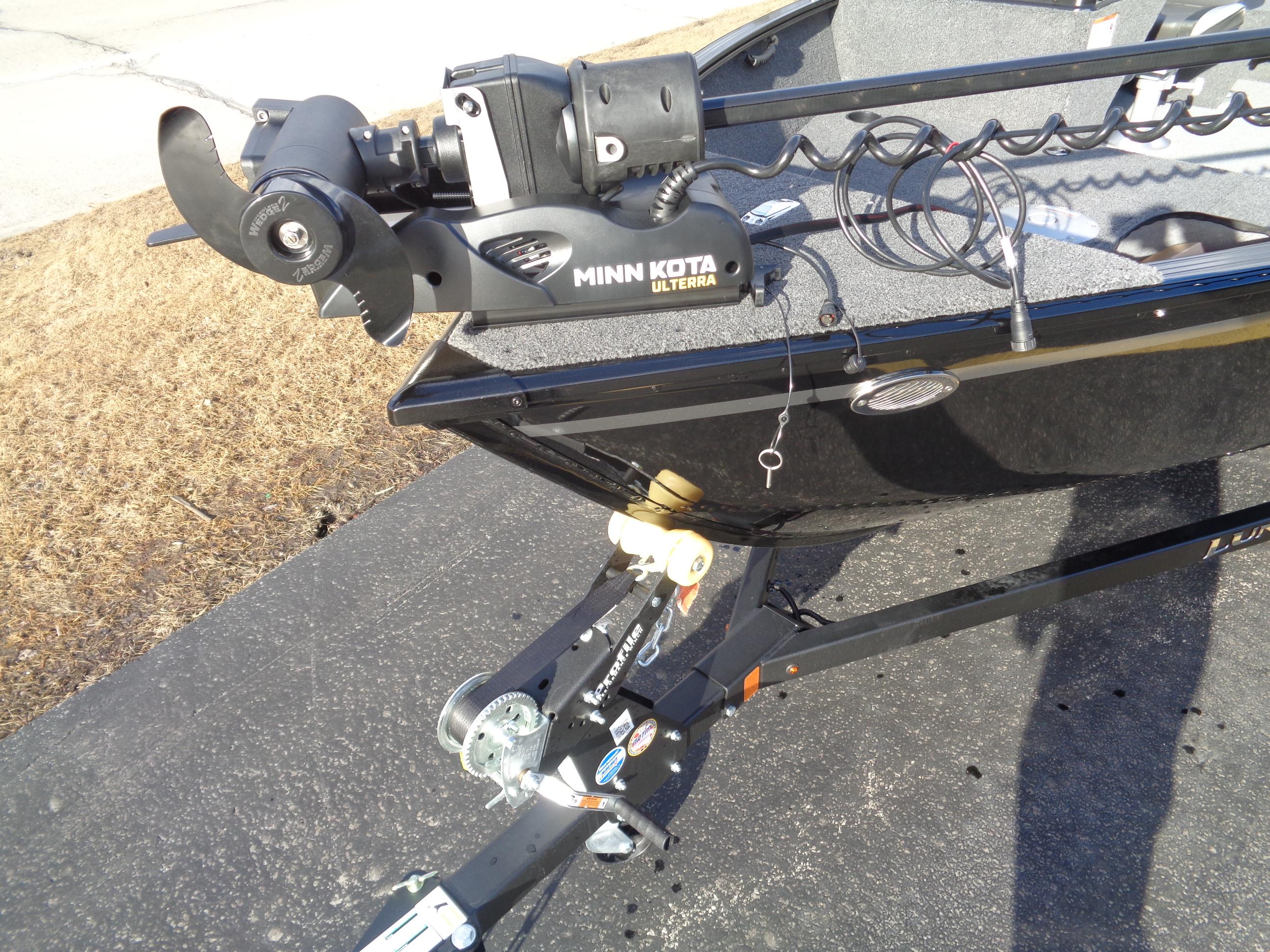 2025 Lund 1650 Rebel XL SS boat with Minn Kota trolling motor on trailer.