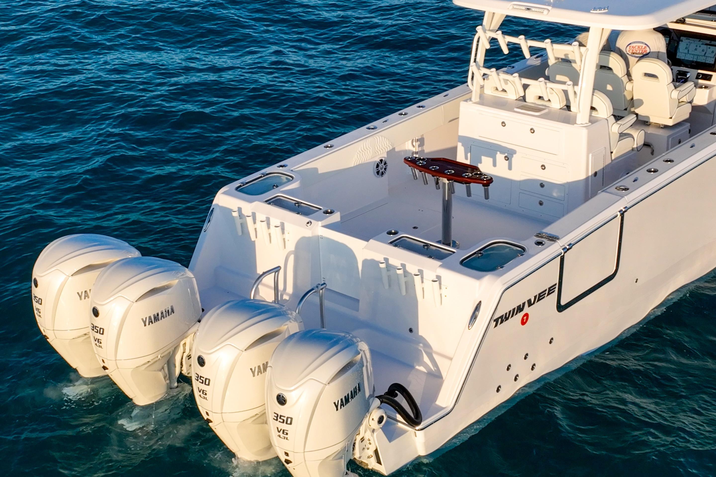 2026 Twin Vee 400 GFX2 CC boat with four Yamaha 350 V6 engines on open water.