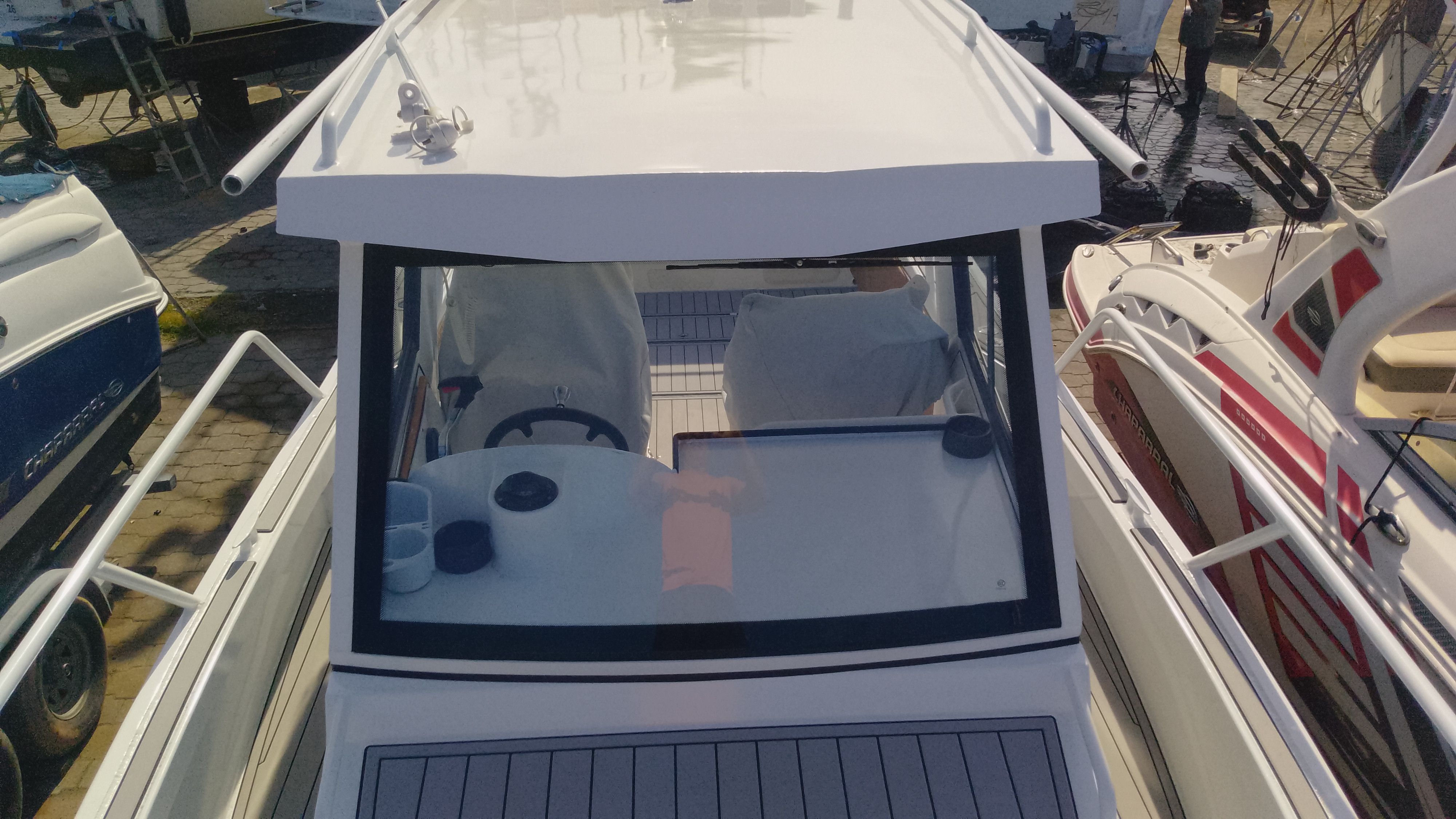 Gospel Boat 7.5M 2024, modern design, parked on a boat deck.