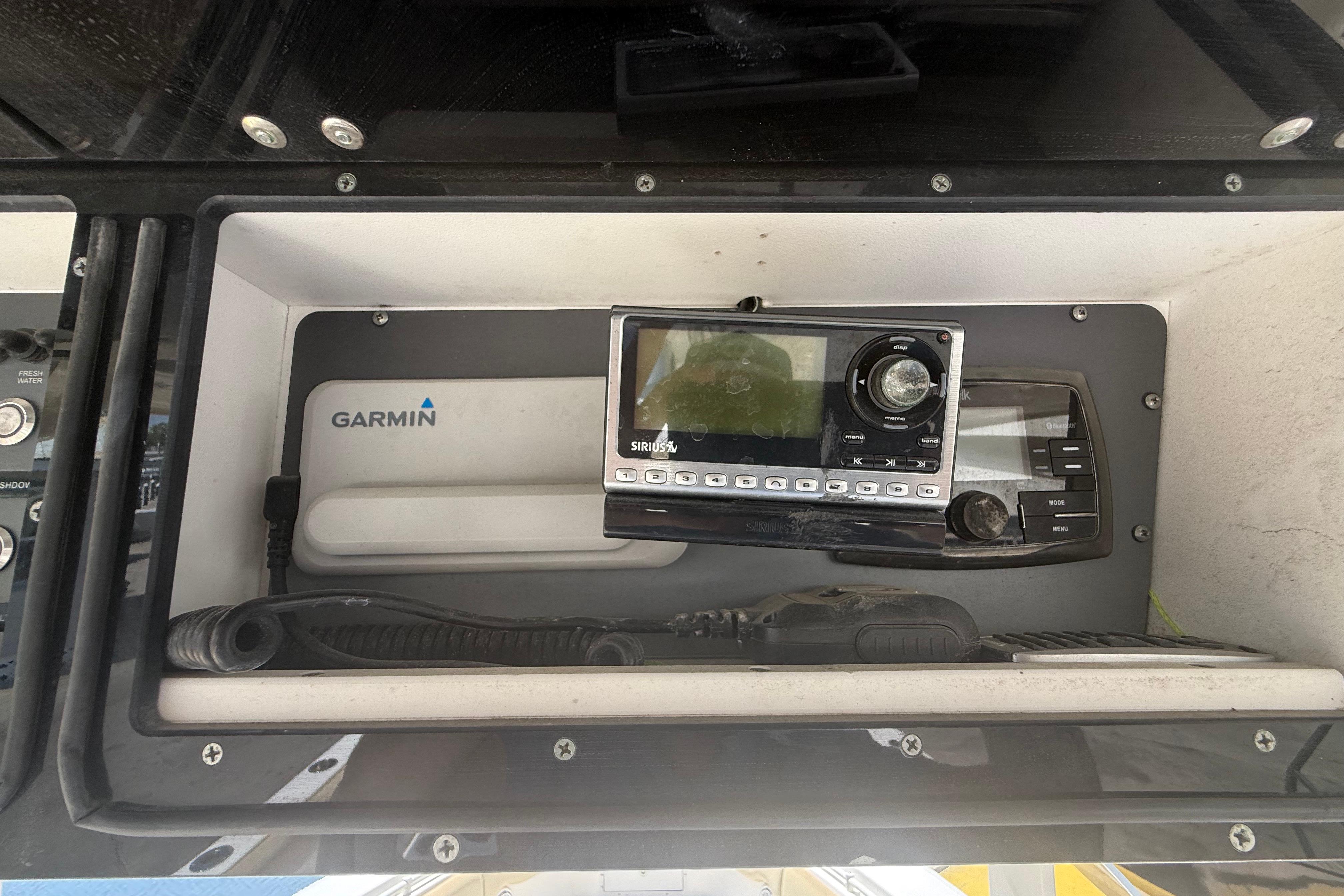 2019 Key West Billistic 281 Center Console dashboard with Garmin and SiriusXM equipment.