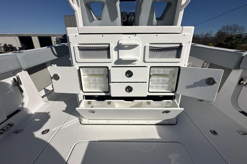 2026 Sportsman Open 282 Center Console with open storage compartments and seating.