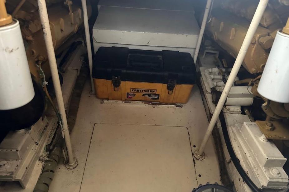 Engine room of 1985 Egg Harbor 33 Sedan with Craftsman toolbox.