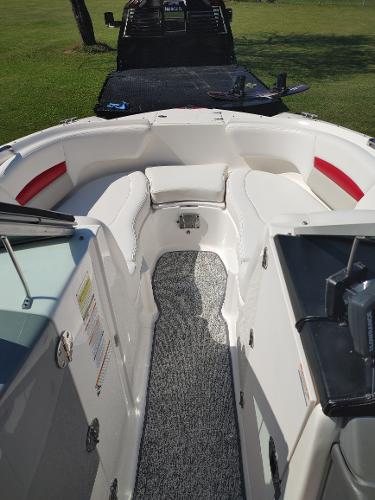 2014 Chaparral 224 Sunesta boat interior with white and red seating.