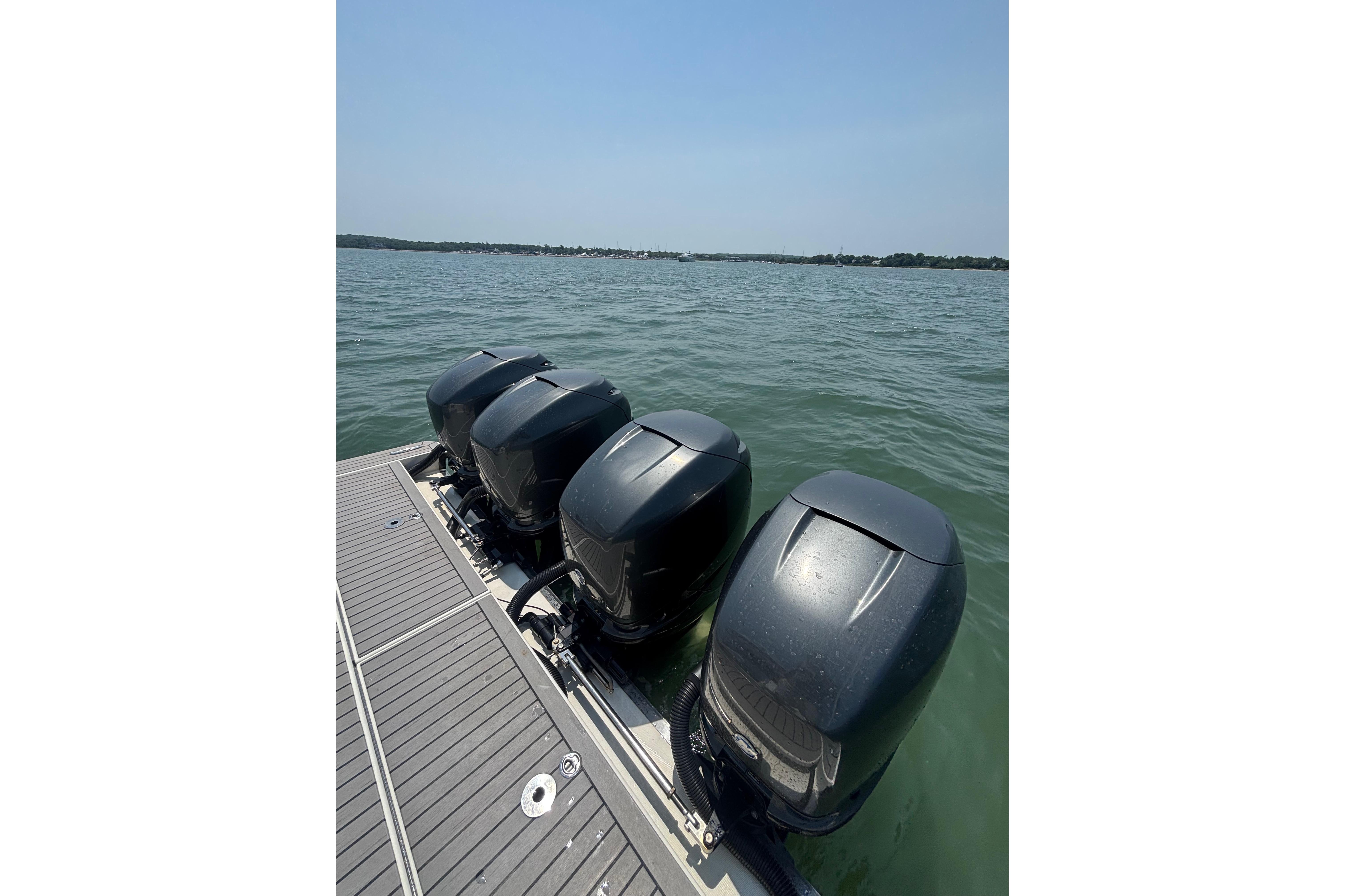 Four powerful outboard motors on a 2019 Formula 430 Super Sport Crossover boat.