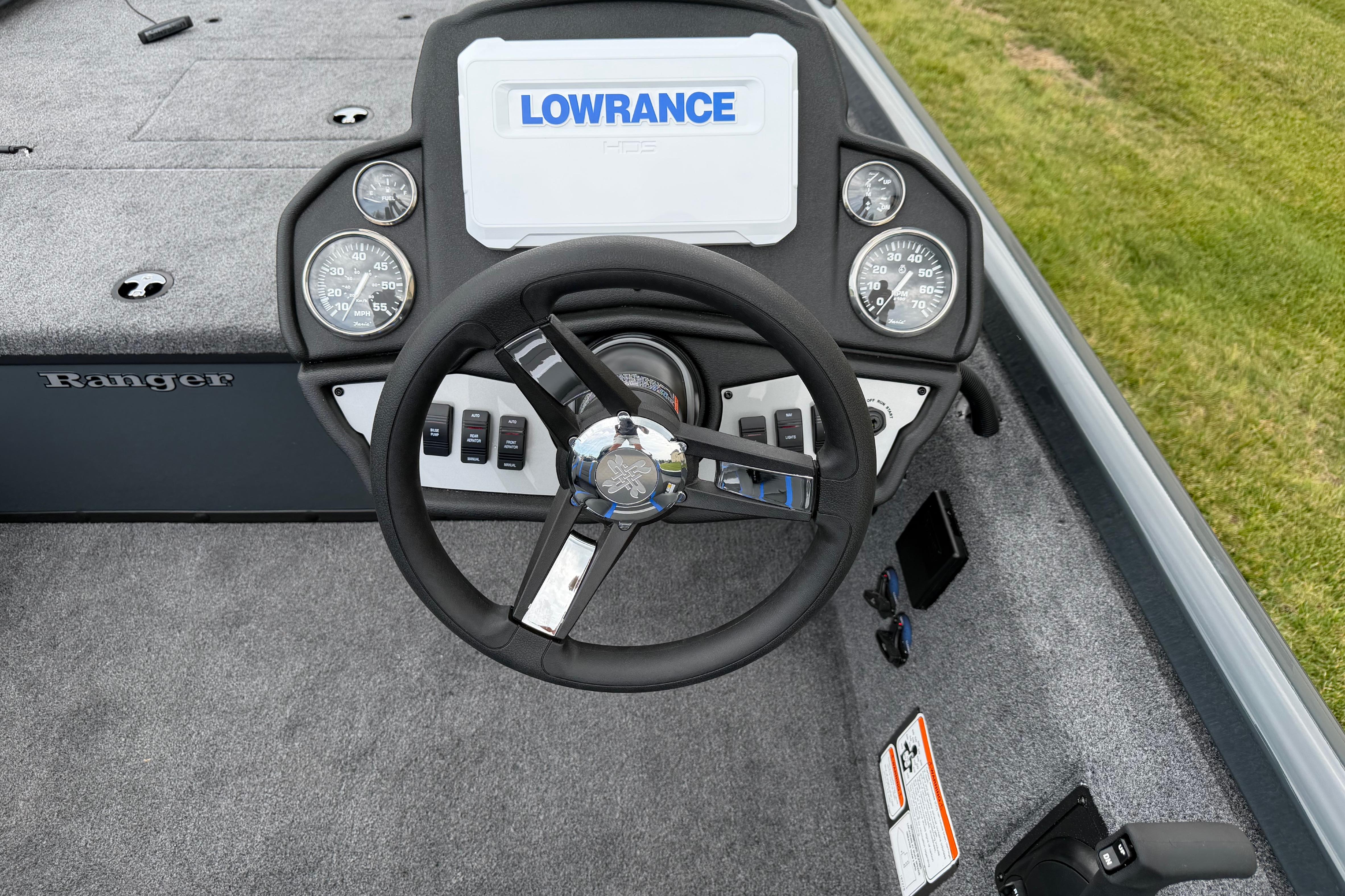 2026 Ranger RT178C boat dashboard with Lowrance display and steering wheel.