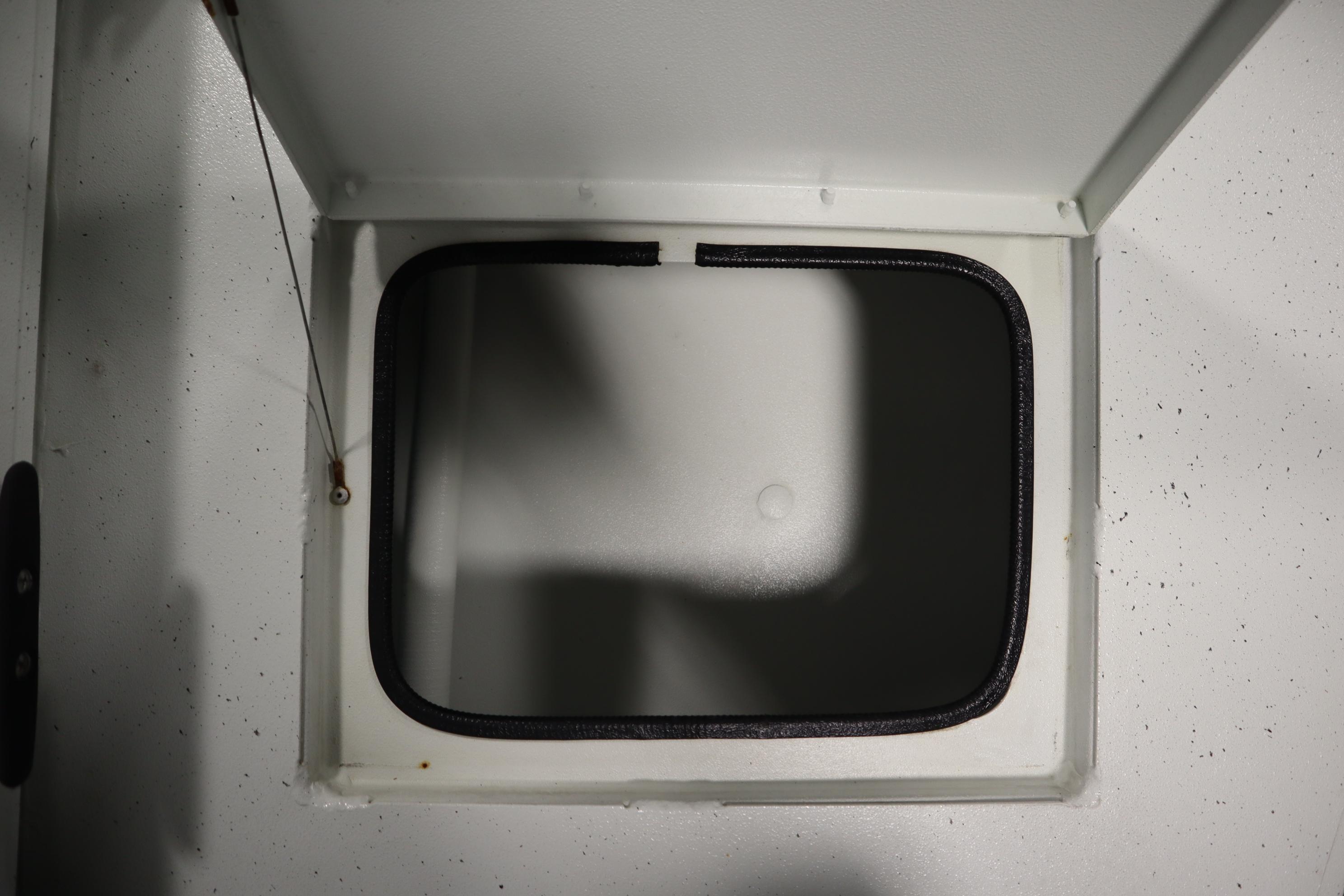 Open storage compartment on 2022 Crestliner 2200 CC boat.