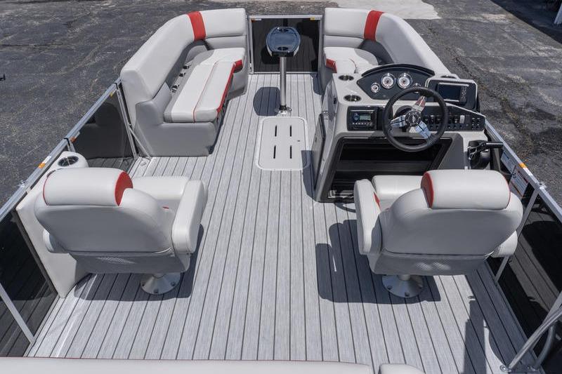 2026 SunCatcher Select 322SL pontoon boat interior with modern seating and steering console.