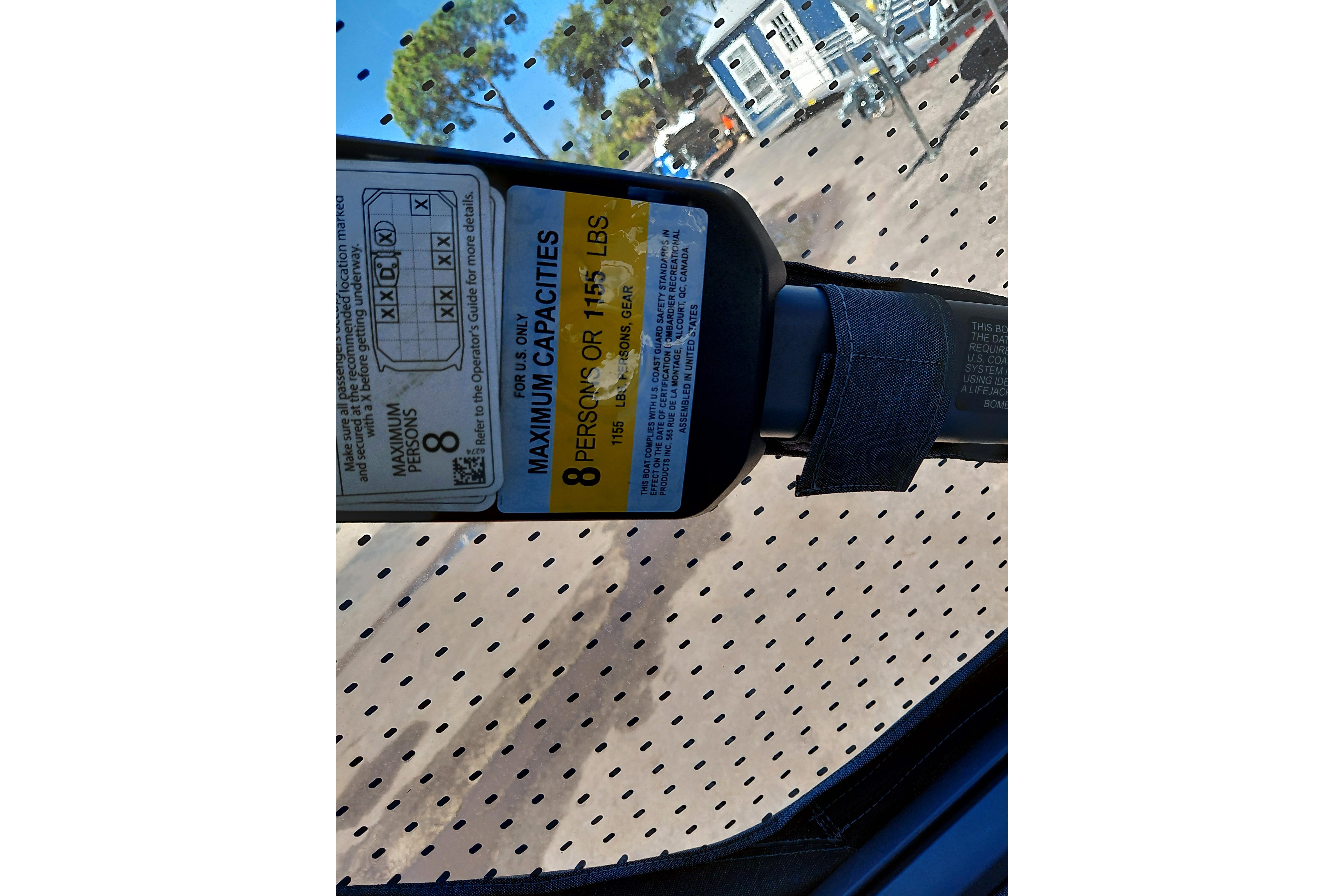 2024 Sea-Doo Switch Cruise 18 capacity label, maximum 8 persons or 1,155 lbs.