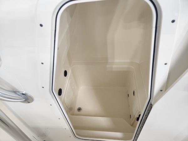 Pathfinder 2400 Open 2025 storage compartment, white interior, open hatch view.